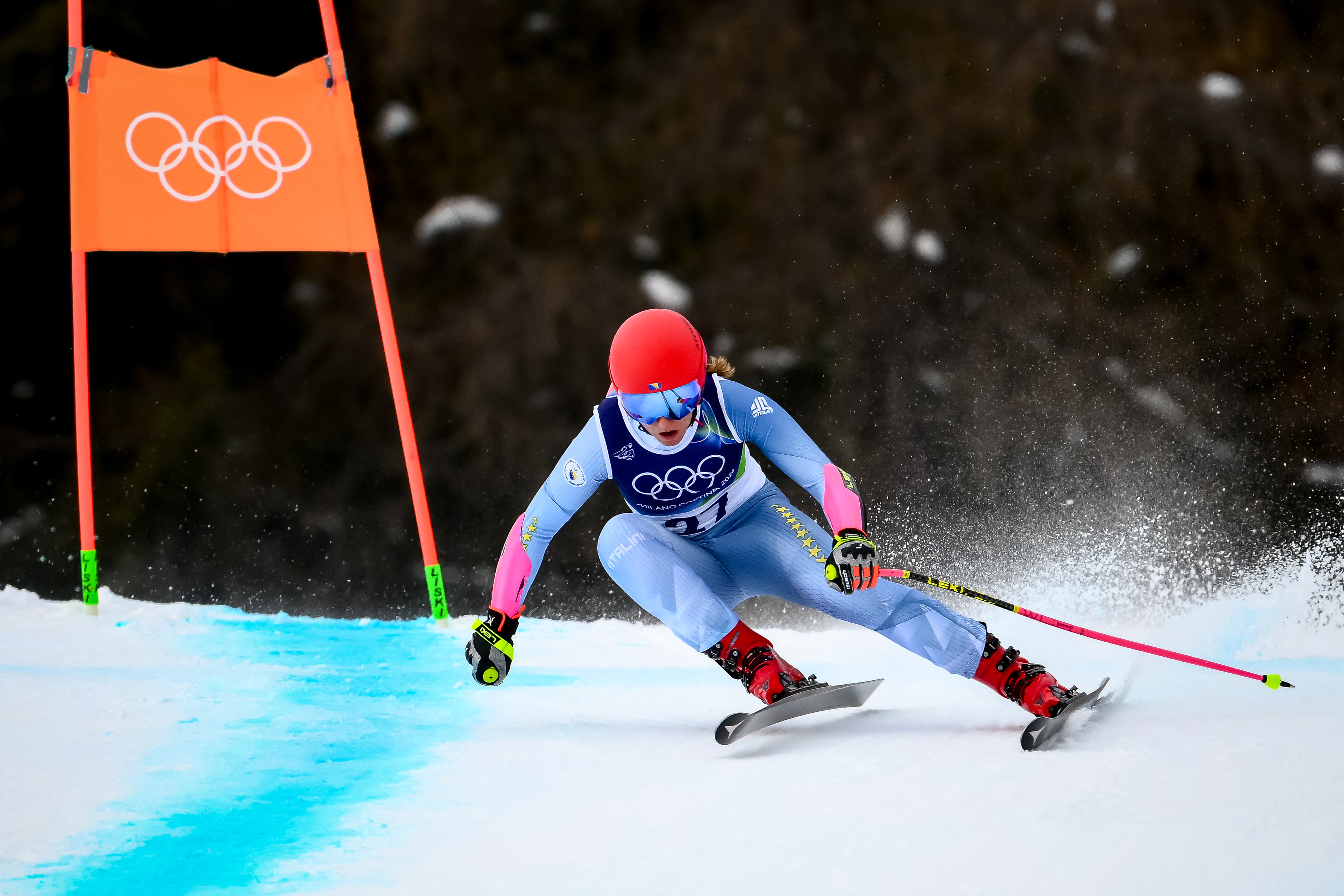 Bosnia-Herzegovina's Elvedina Muzaferija competes in the women's super-G event during the Milano Cortina 2026 Winter Olympic Games at the Tofane Alpine Skiing Centre in Cortina d’Ampezzo on February 12, 2026. (Photo by Marco BERTORELLO / AFP)