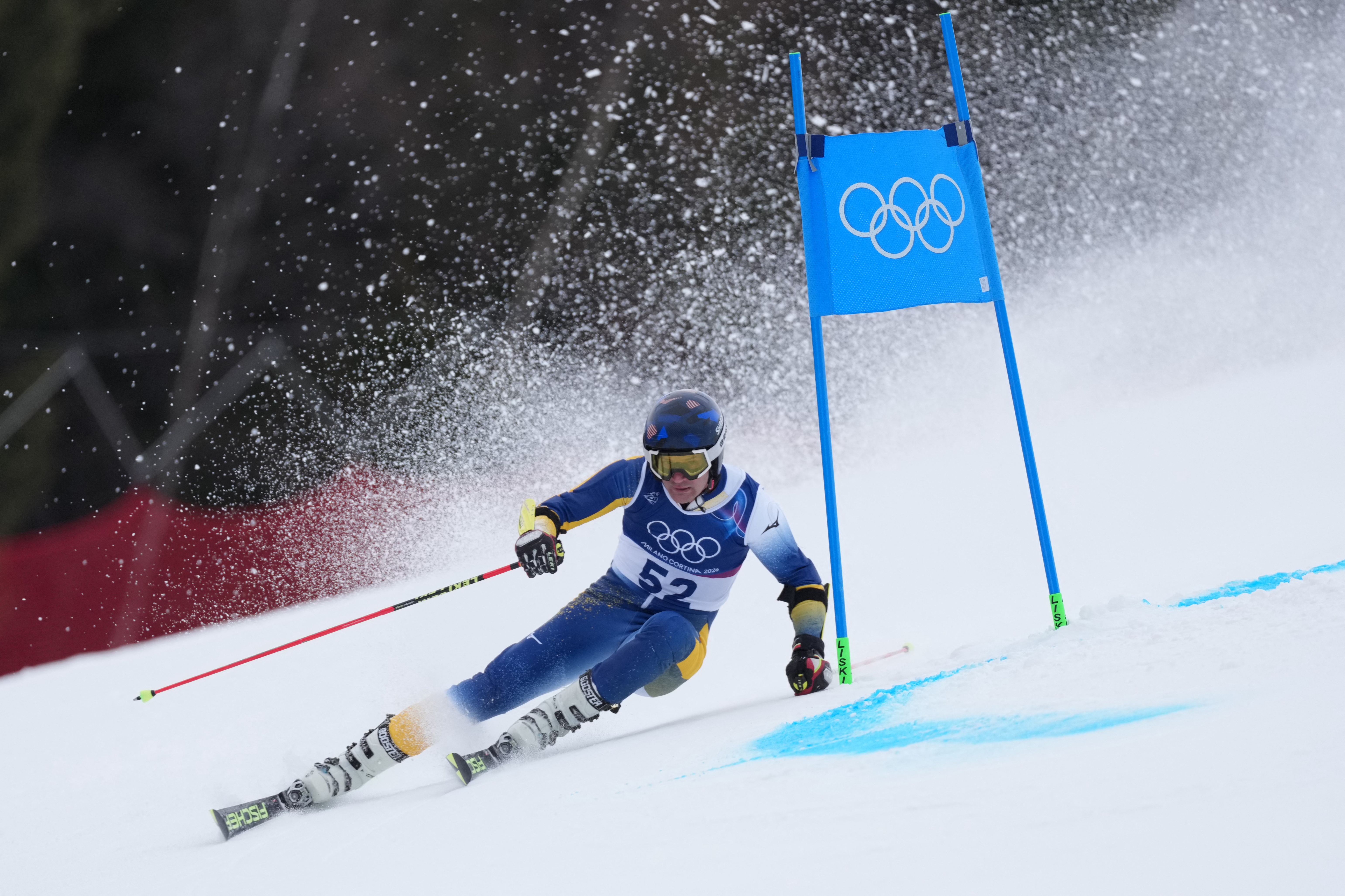 Bosnia-Herzegovina's Marko Sljivic competes in the first run of the men's giant slalom alpine skiing event during the Milano Cortina 2026 Winter Olympic Games at the Stelvio Ski Centre in Bormio (Valtellina) on February 14, 2026. (Photo by Dimitar DILKOFF