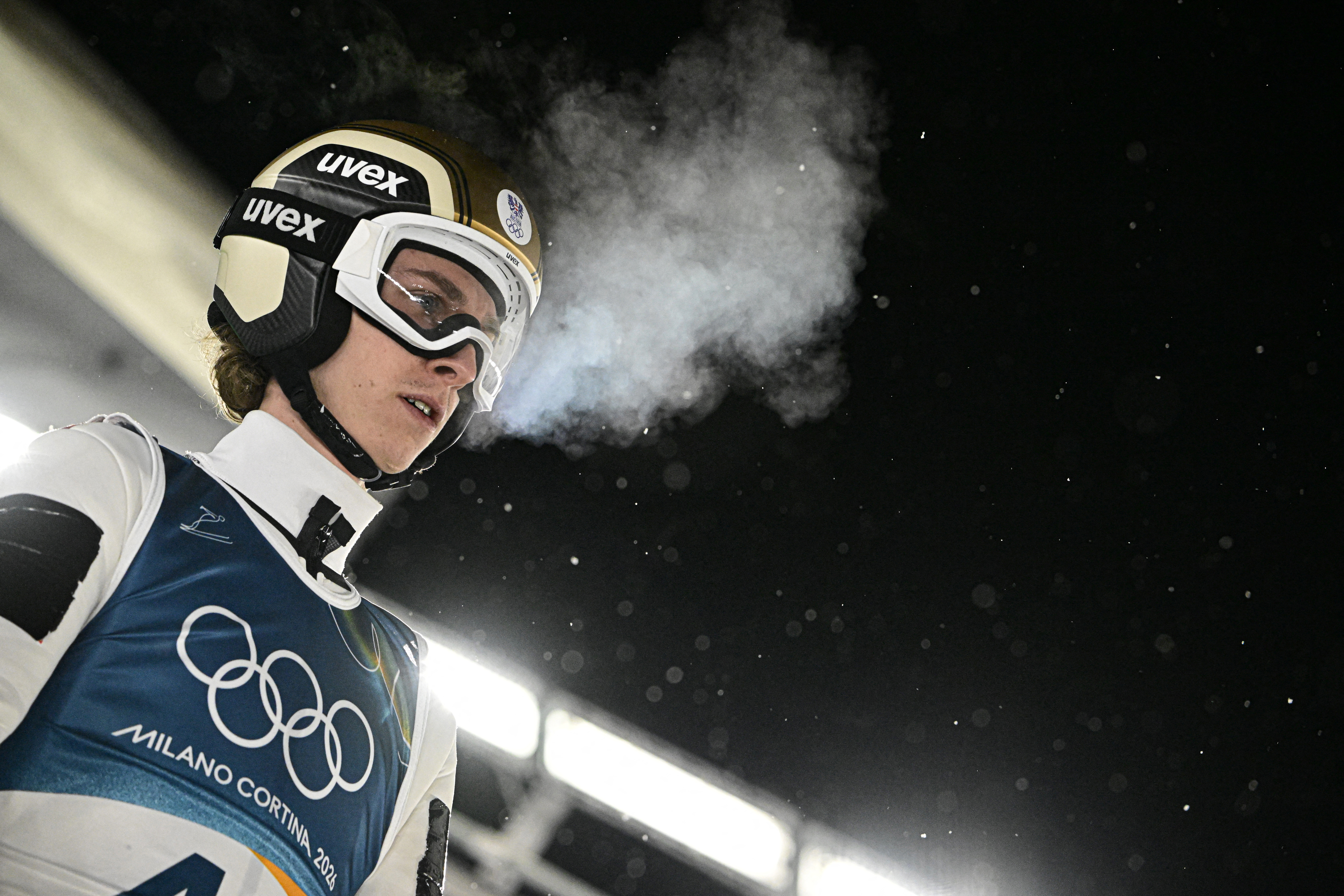 Austria's Daniel Tschofenig reacts as he prepares for a jump during the trial round