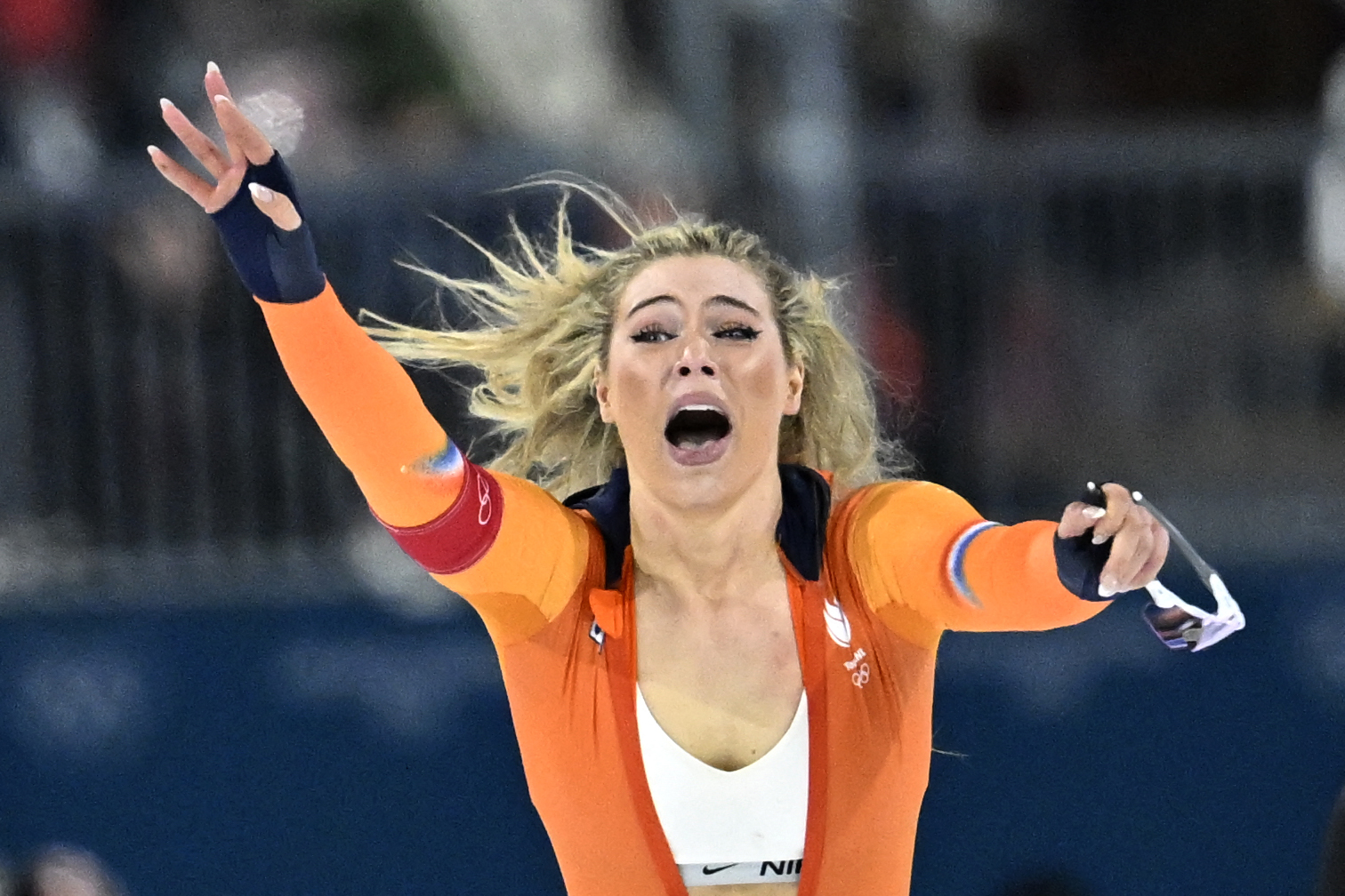 Netherlands' Jutta Leerdam reacts after winning gold in the speed skating women's 1000m during the Milano Cortina 2026 Winter Olympic Games at Milano Speed Skating Stadium in Milan on February 9, 2026. (Photo by WANG Zhao / AFP)