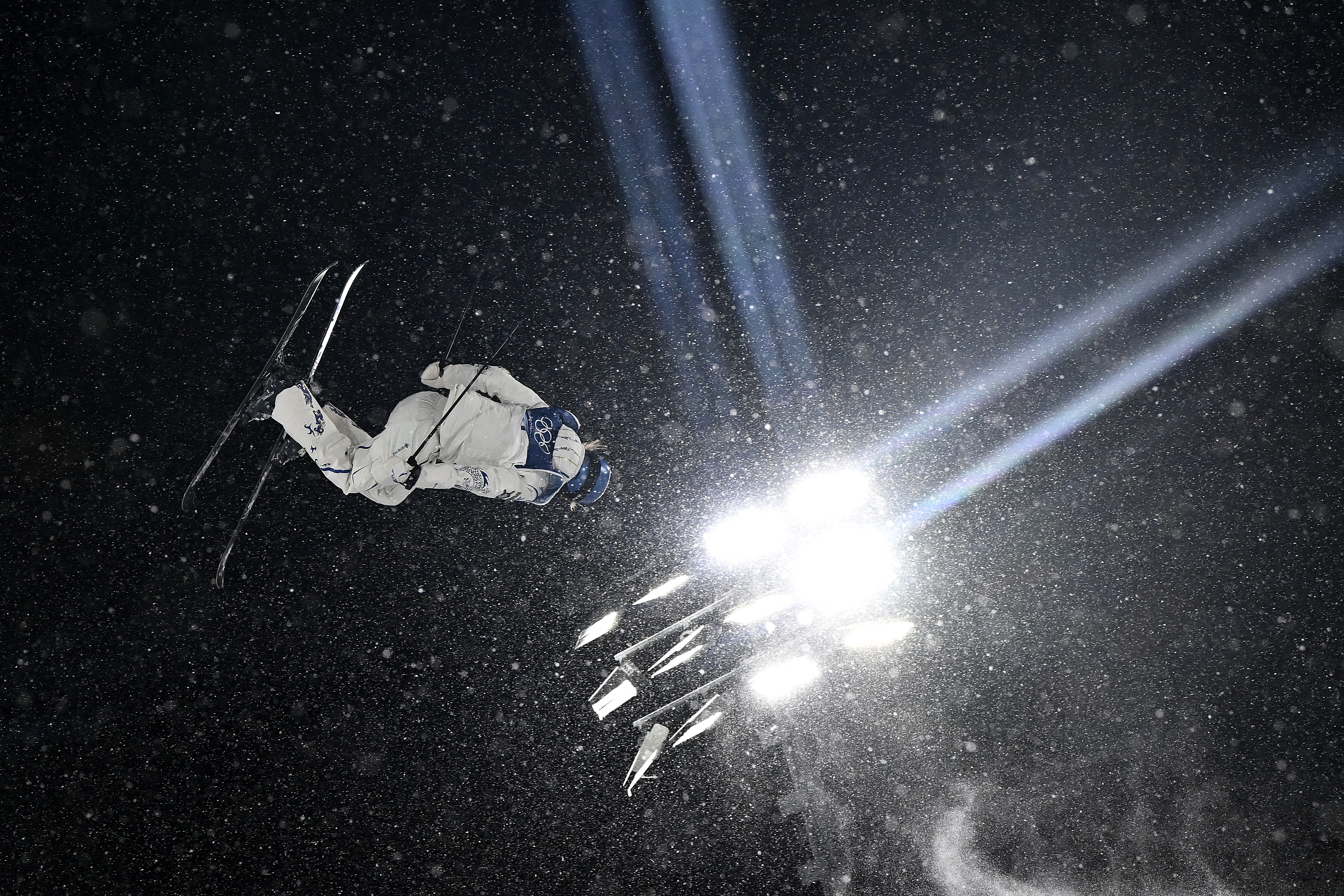 China's Gu Ailing Eileen competes in the freestyle skiing women's freeski big air final run 3 during the Milano Cortina 2026 Winter Olympic Games at Livigno Snow Park, in Livigno (Valtellina), on February 16, 2026. (Photo by Jeff PACHOUD / AFP)