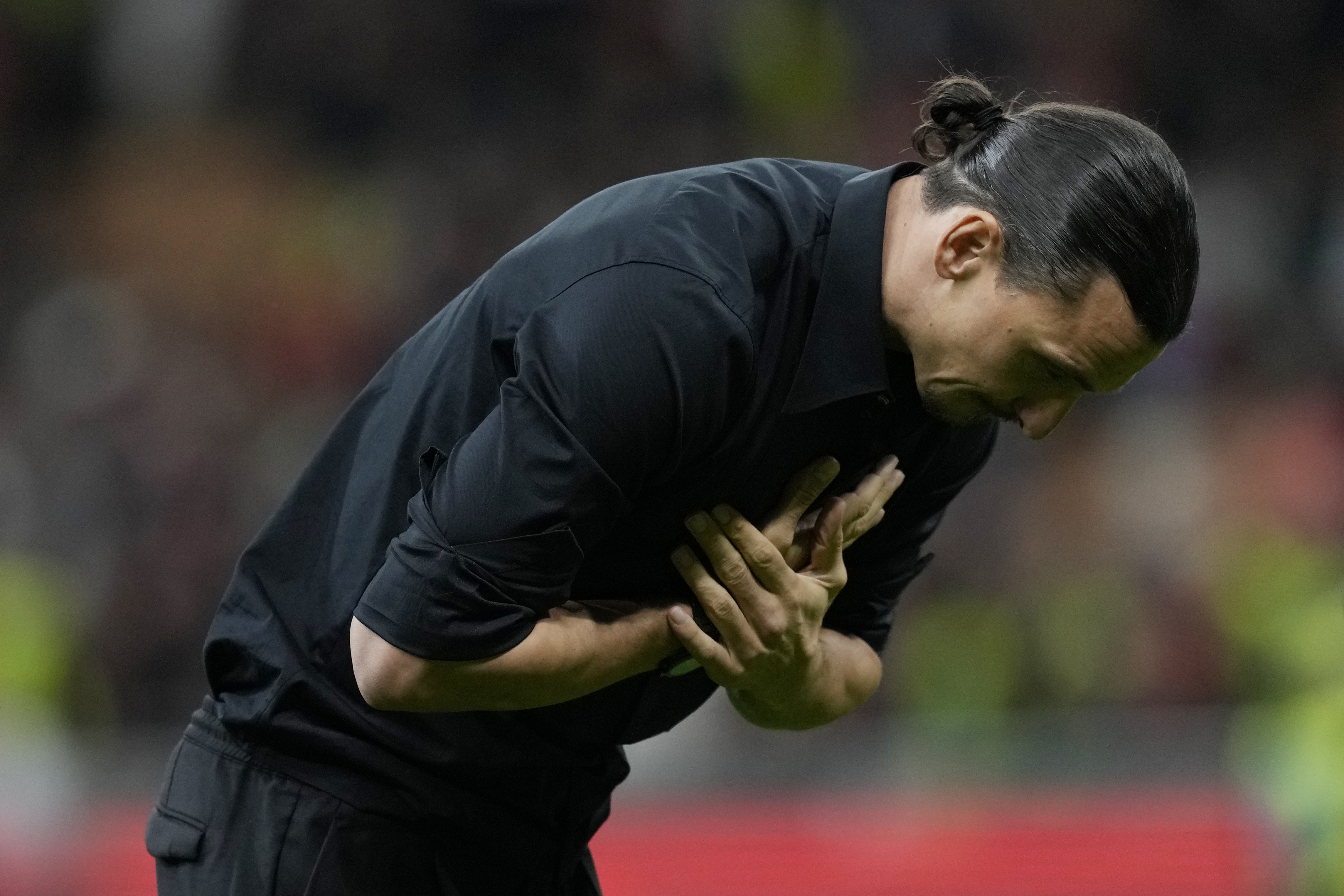 AC Milan's Zlatan Ibrahimovic reacts after his last game for the club at the end of a Serie A soccer match between AC Milan and Hellas Verona at the San Siro stadium, in Milan, Italy, Sunday, June 4, 2023. (AP Photo/Antonio Calanni)