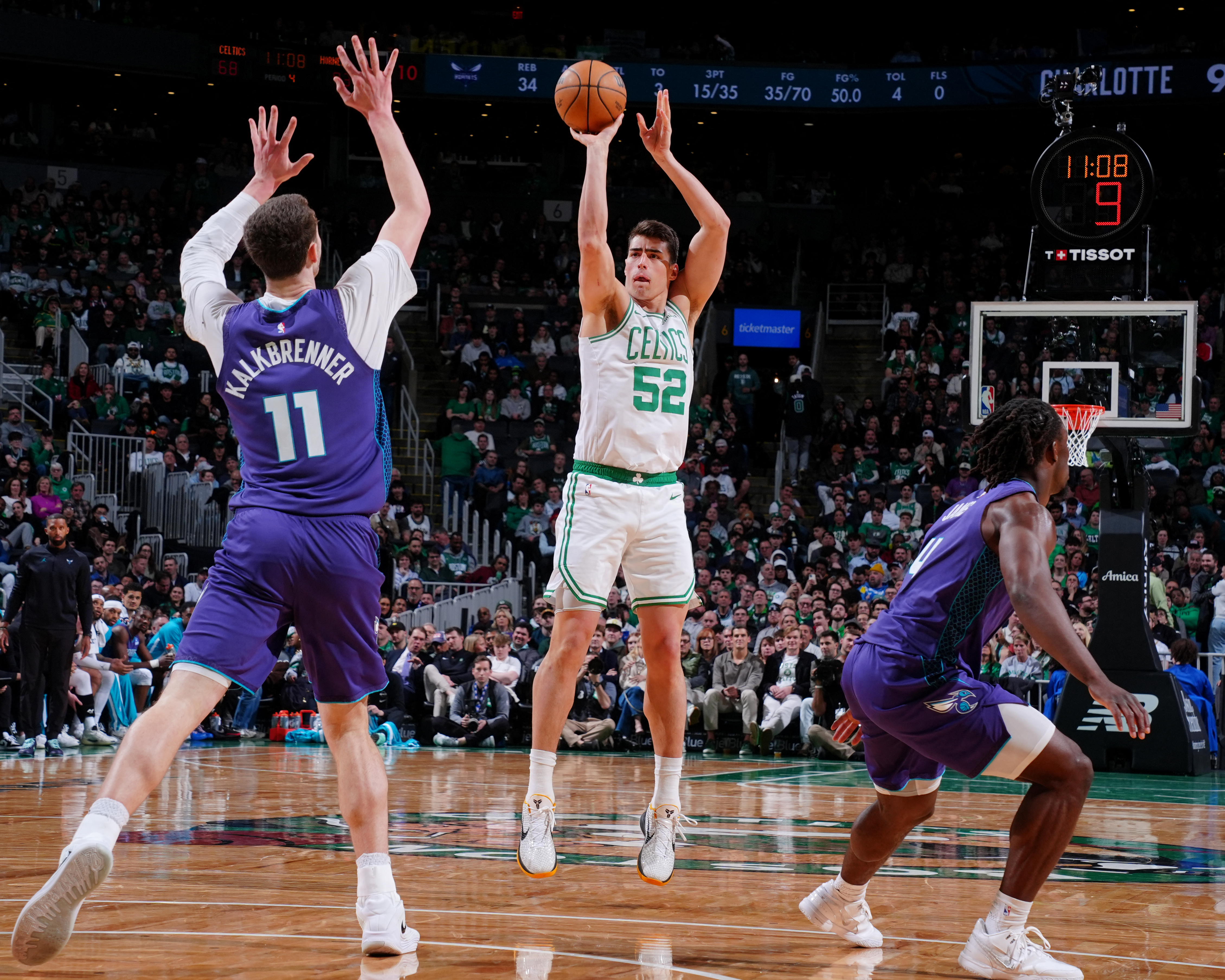 BOSTON, MA - MARCH 4: Luka Garza #52 of the Boston Celtics shoots a three point