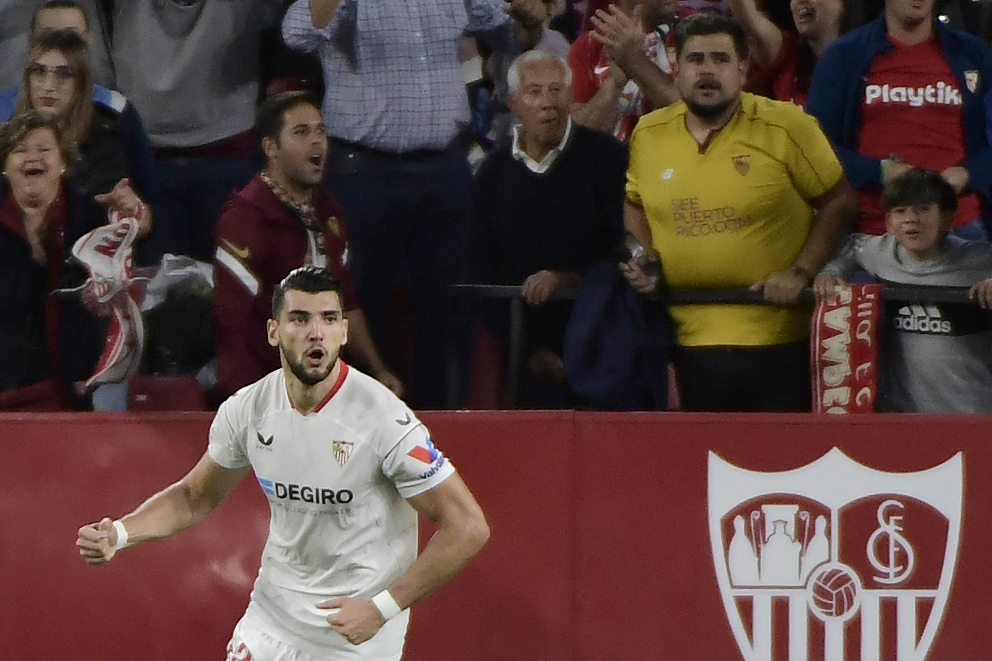 Sevilla's Spanish forward Rafa Mir celebrates scoring his team's first goal during the Spanish league football match between Sevilla FC and Real Sociedad at the Ramon Sanchez Pizjuan stadium in Seville on November 9, 2022. (Photo by CRISTINA QUICLER / AFP