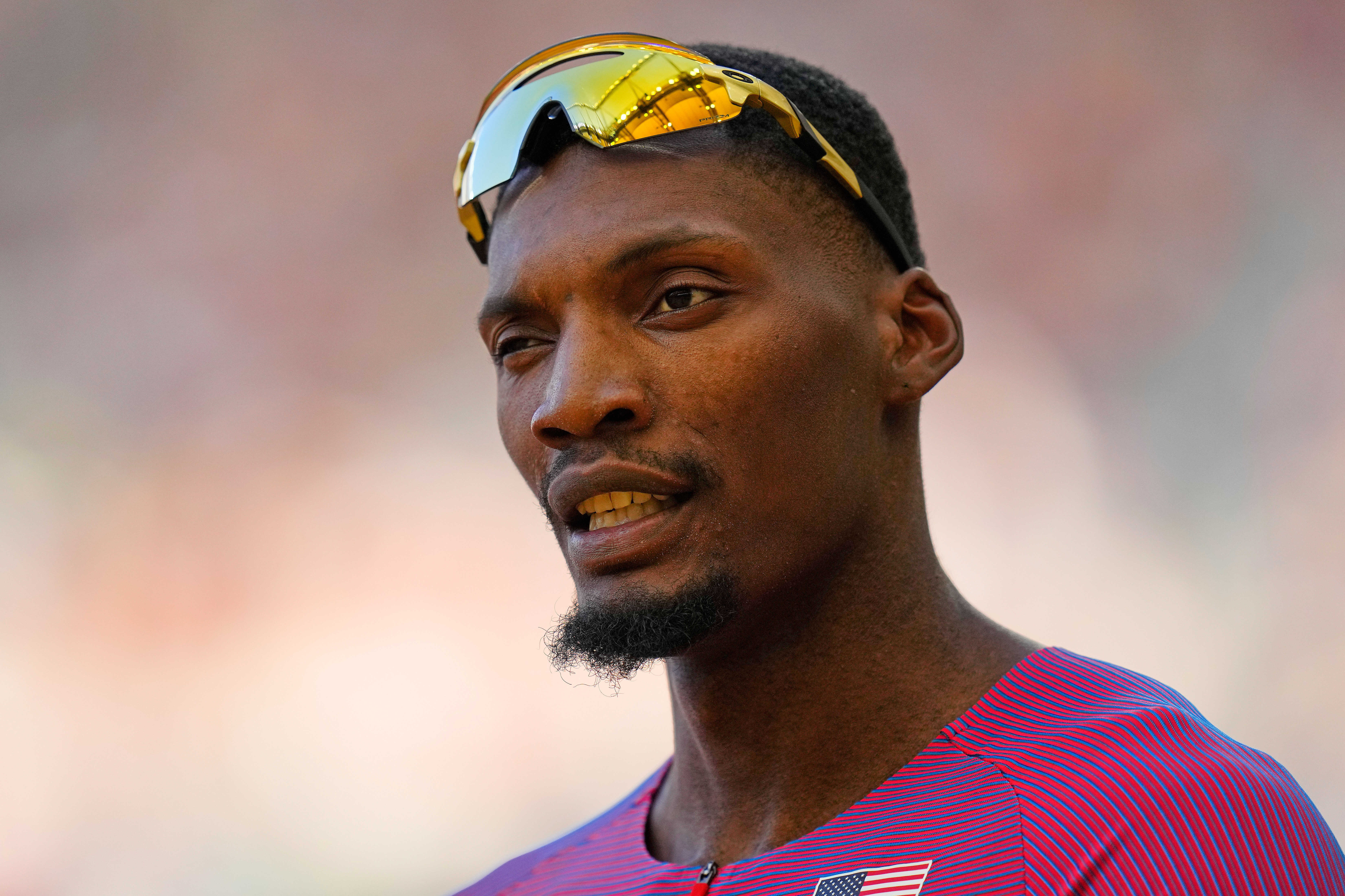 FILE - Fred Kerley, of the United States reacts after finishing a men's 100-meters semifinal during the World Athletics Championships in Budapest, Hungary, Sunday, Aug. 20, 2023. (AP Photo/Petr David Josek, File)