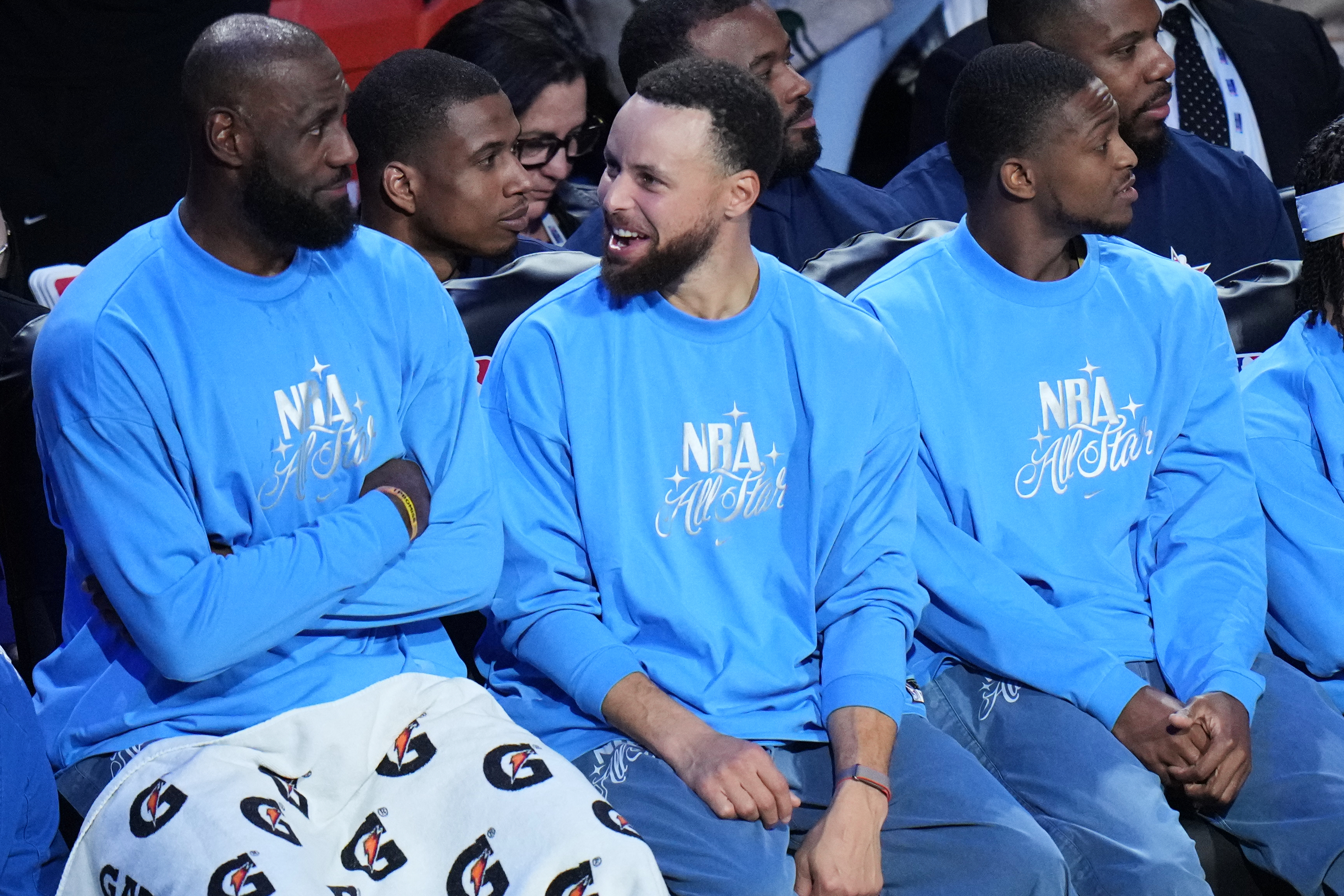 USA Stripes guard Stephen Curry talks to forward LeBron James during the NBA All-Star basketball game against USA Stars Sunday, Feb. 15, 2026, in Inglewood, Calif. (AP Photo/Jae C. Hong)