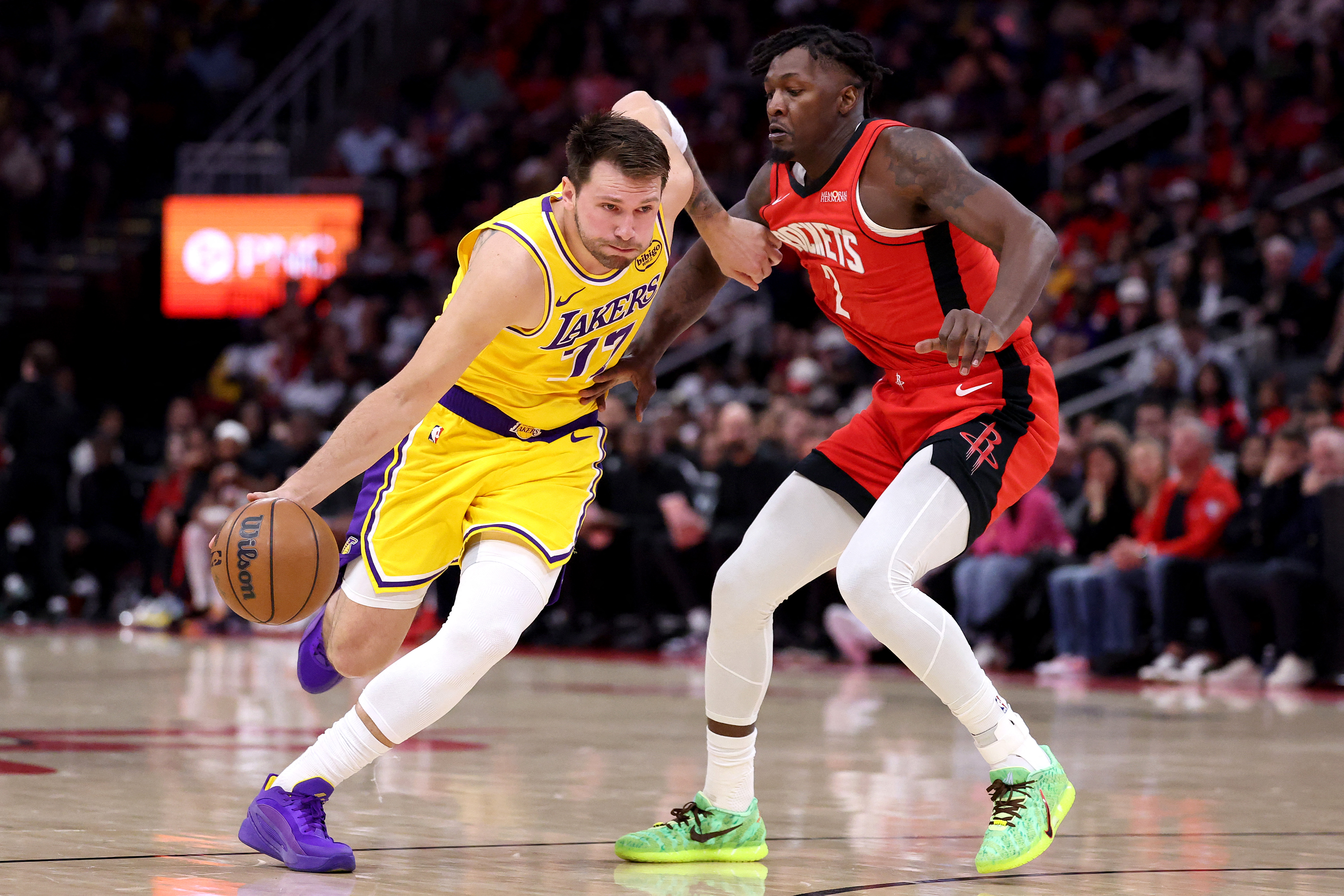 HOUSTON, TEXAS - MARCH 16: Luka Doncic #77 of the Los Angeles Lakers drives to
