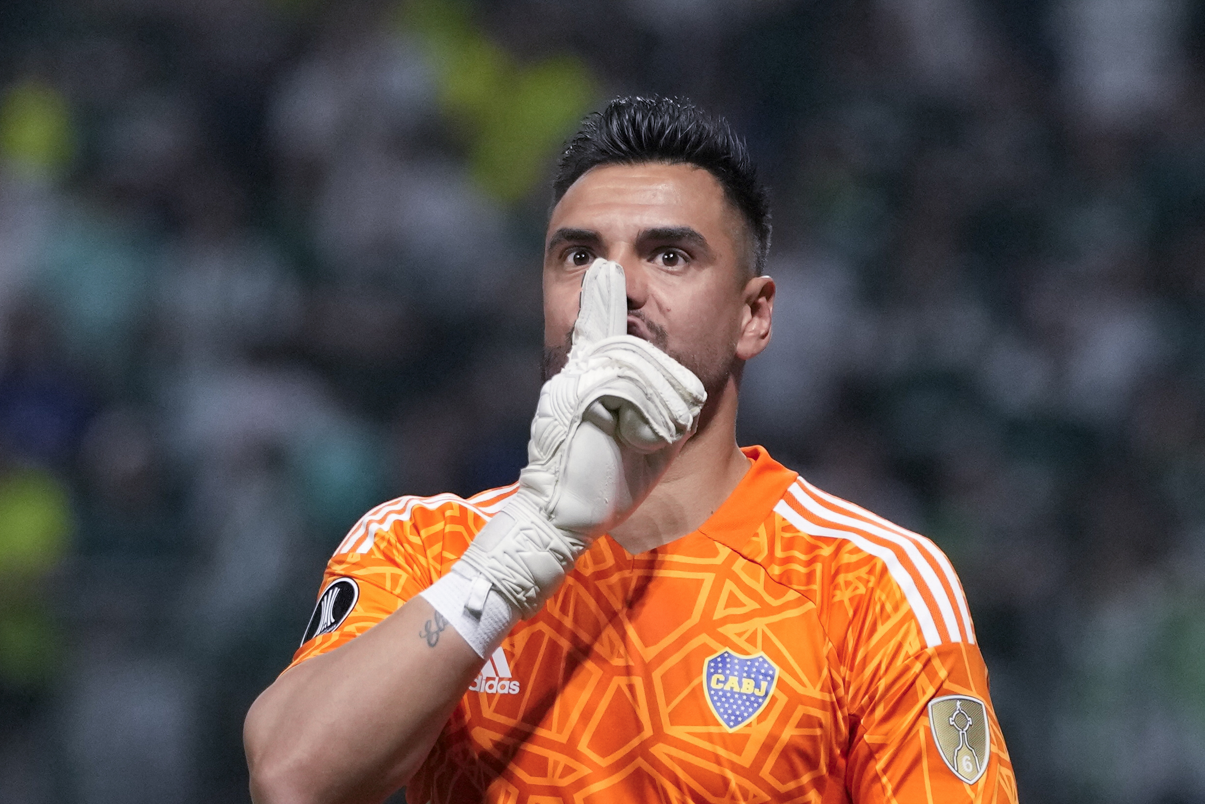Goalkeeper Sergio Romero of Argentina's Boca Juniors celebrates after stoping a shot from Raphael Veiga of Brazil's Palmeiras in a penalty shootout during a Copa Libertadores semifinal second leg soccer match at Allianz Parque stadium in Sao Paulo, Brazil