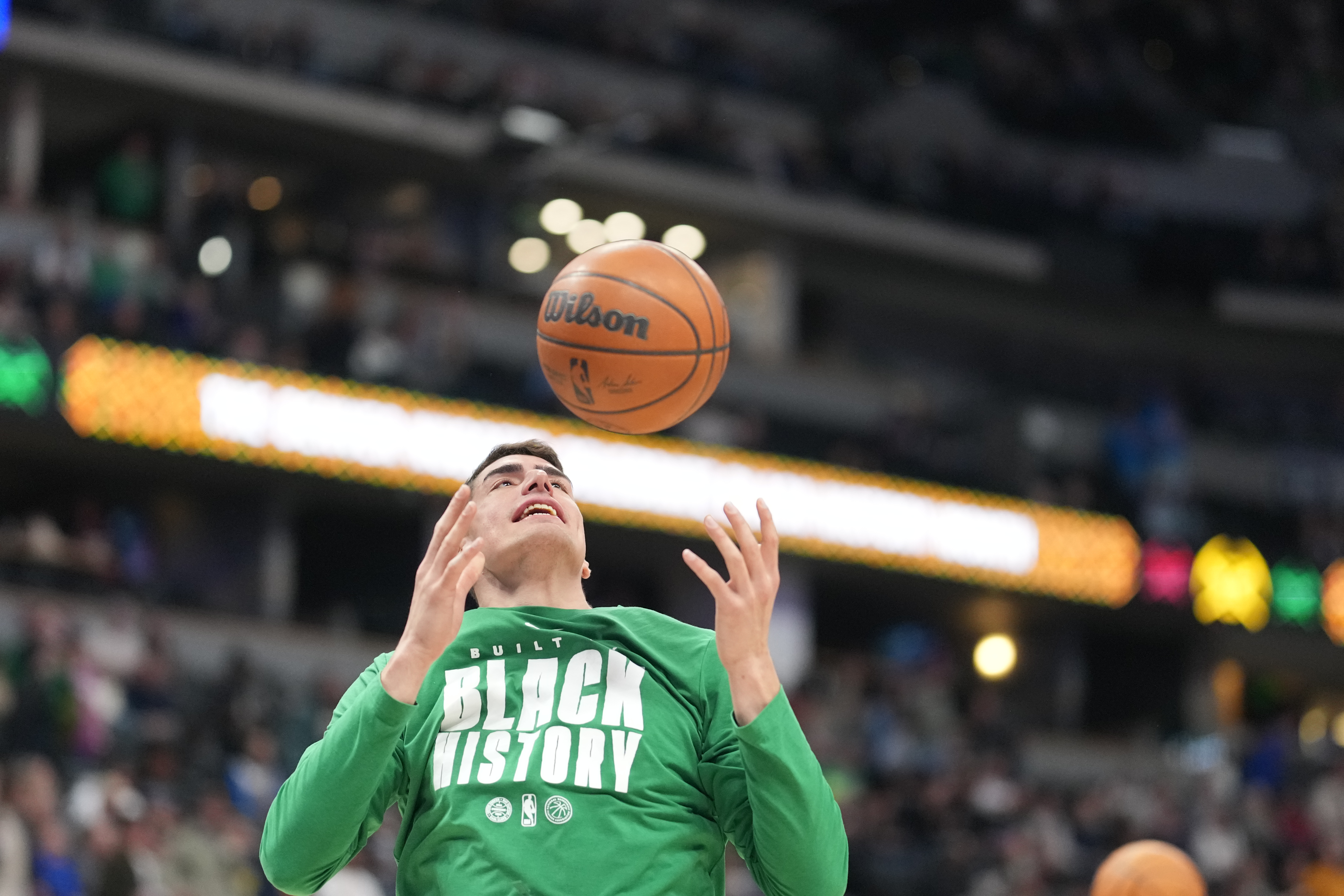 Boston Celtics center Luka Garza (52) in the first half of an NBA basketball game Wednesday, Feb. 25, 2026, in Denver. (AP Photo/David Zalubowski)