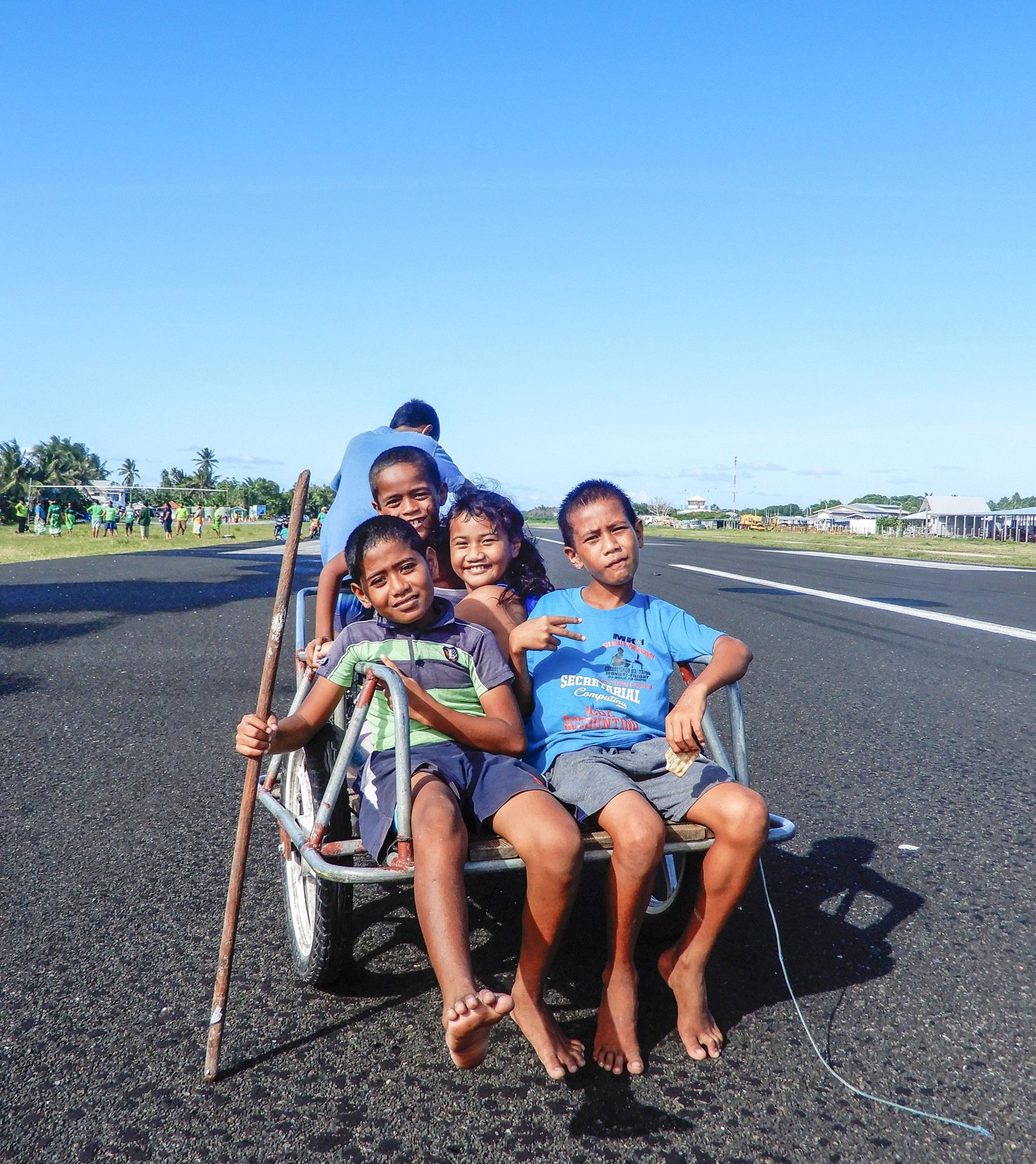 Children play on an airport runway in the Tuvaluan capital of Funafuti on Oct. 11, 2019. (Kyodo)==Kyodo,Image: 501162497, License: Rights-managed, Restrictions: , Model Release: no, Credit line: Kyodo/Newscom / Newscom / Profimedia