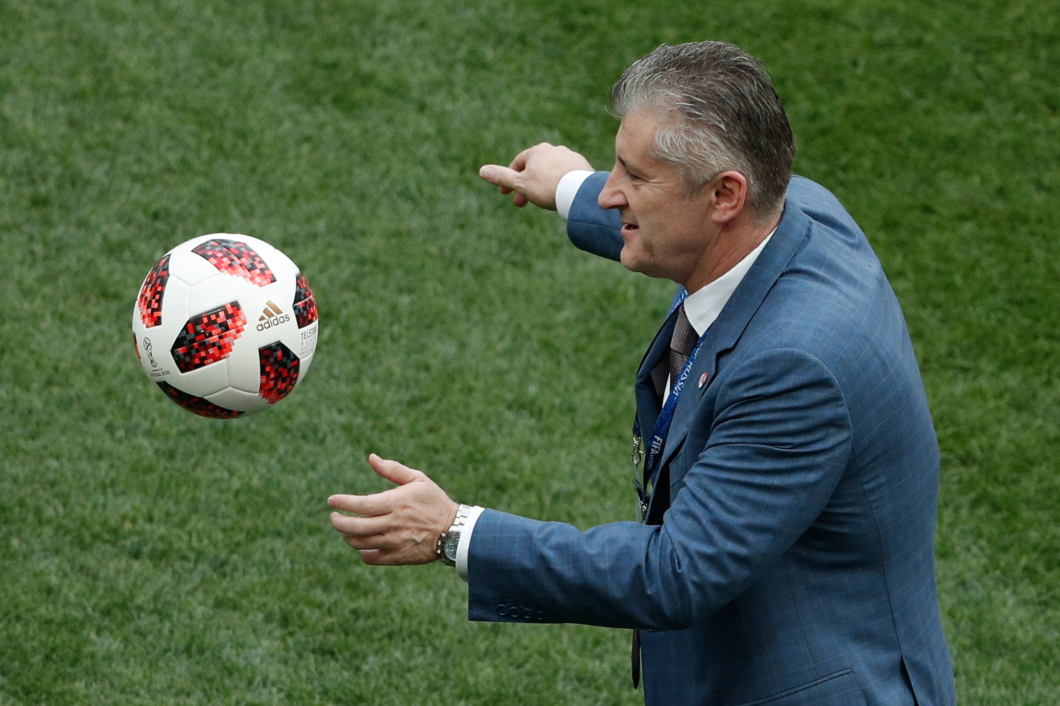 President of the Croatian Football Federation Davor Suker plays with the ball prior t