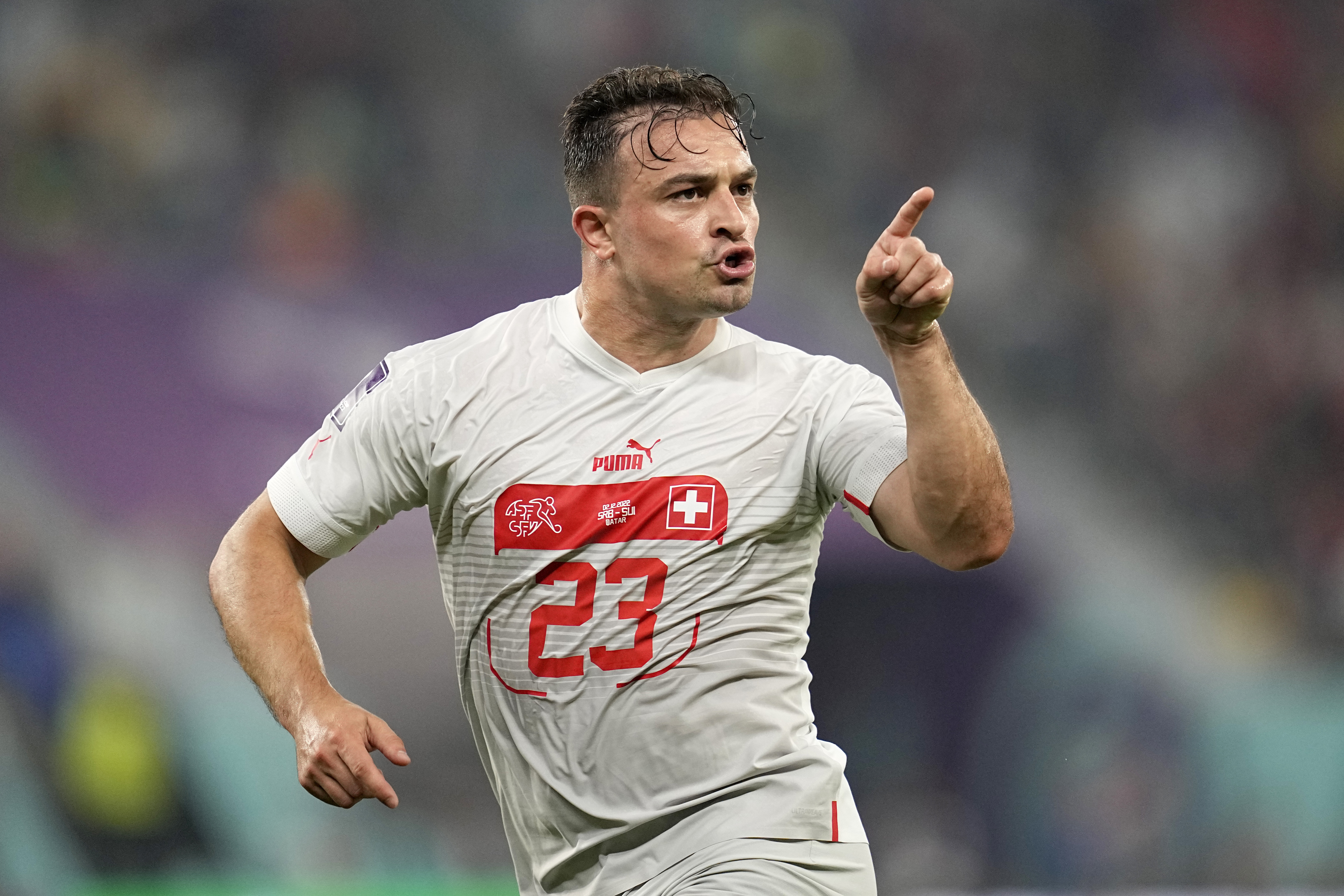 FILE - Switzerland's Xherdan Shaqiri celebrates after scoring his side's opening goal during the World Cup group G soccer match between Serbia and Switzerland, at the Stadium 974 in Doha, Qatar, Friday, Dec. 2, 2022. (AP Photo/Ebrahim Noroozi, File)
