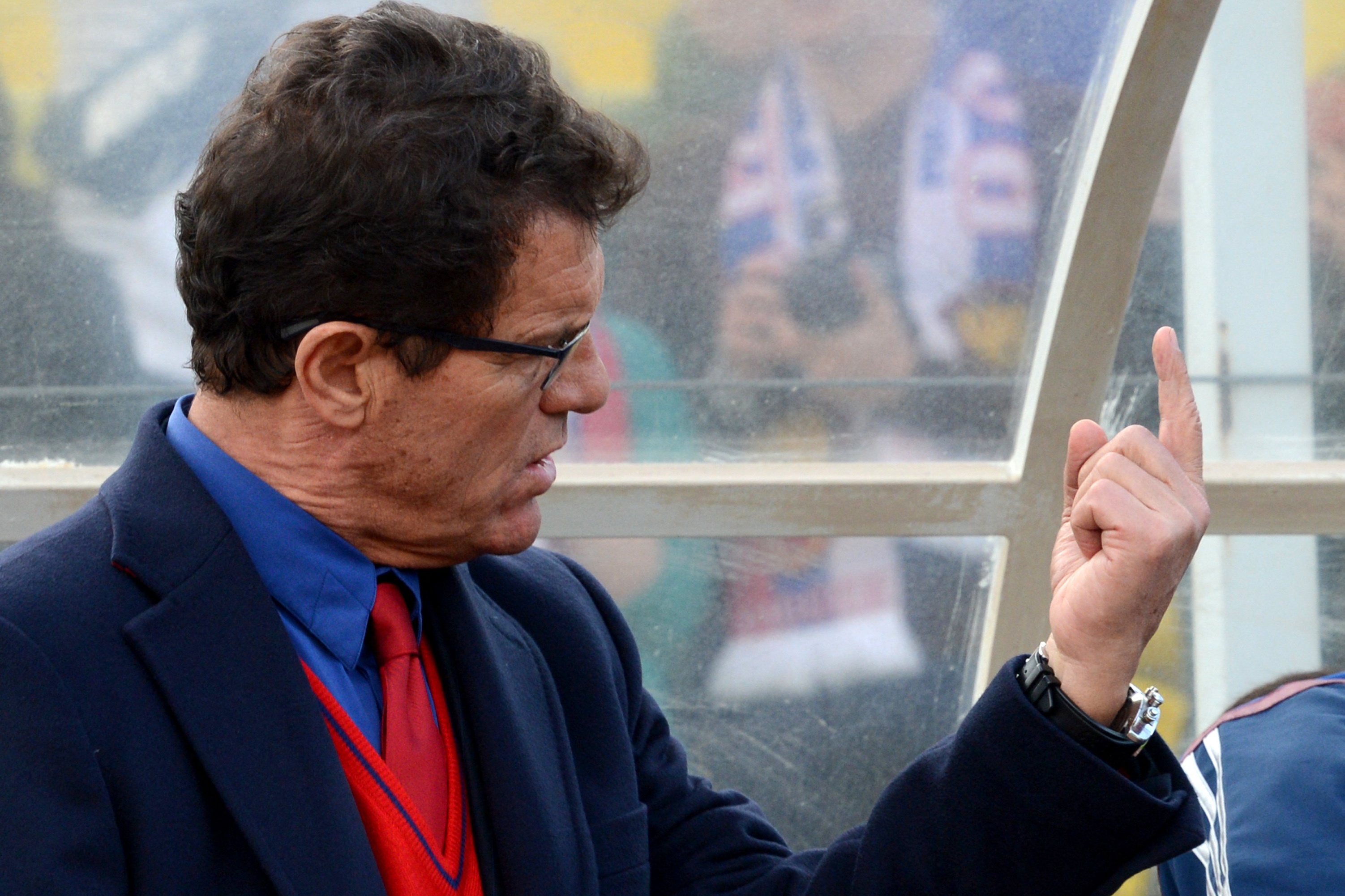 Russia's national football team head coach Fabio Capello reacts before the FIFA 2014 World Cup friendly match between Russia and Armenia in the city of Krasnodar on March 5, 2014. AFP PHOTO/KIRILL KUDRYAVTSEV (Photo by KIRILL KUDRYAVTSEV / AFP)