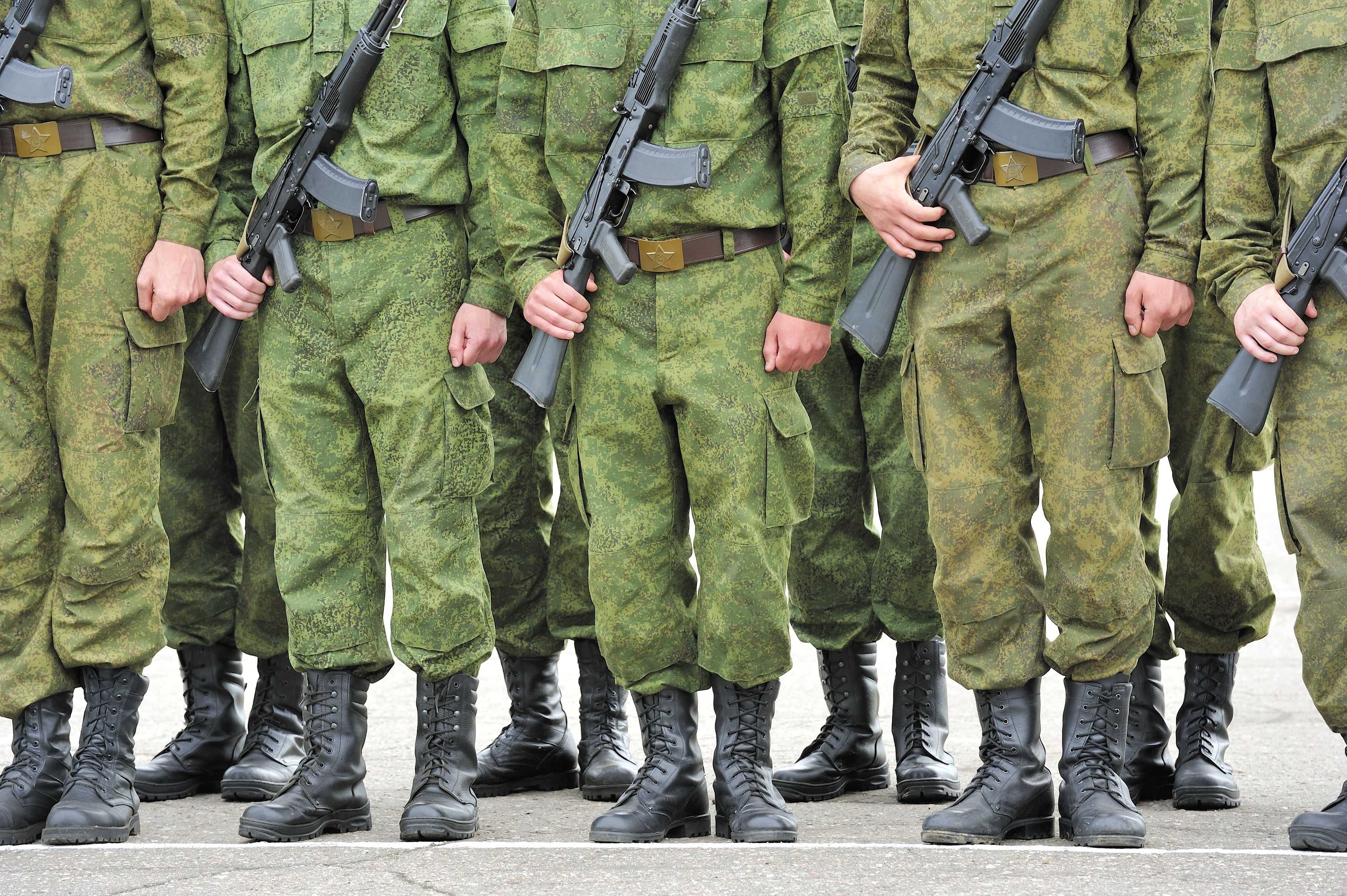 russian soldiers in camouflage suit with machine