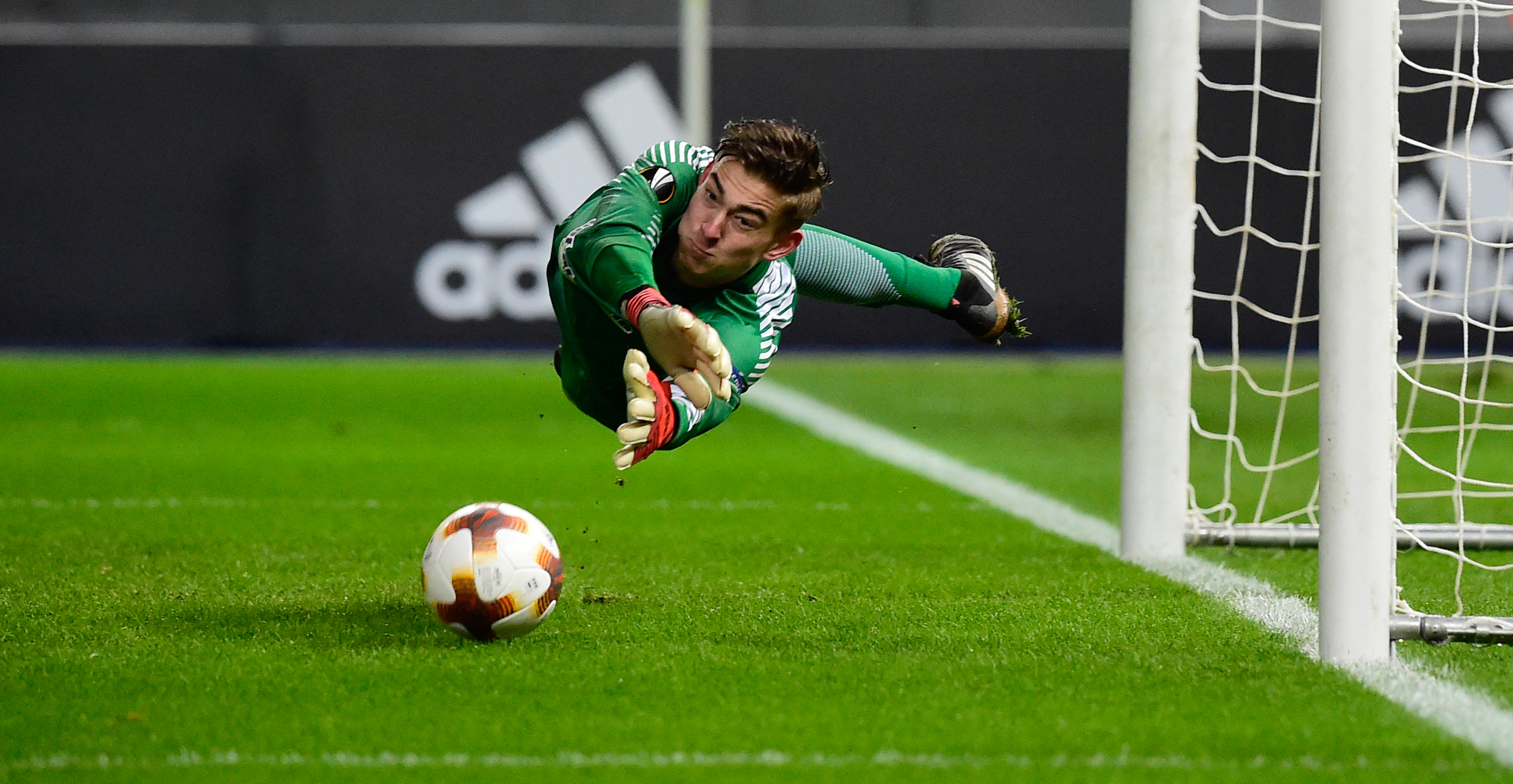 Hertha Berlin's goalkeeper Jonathan Klinsmann saves a ball during the UEFA