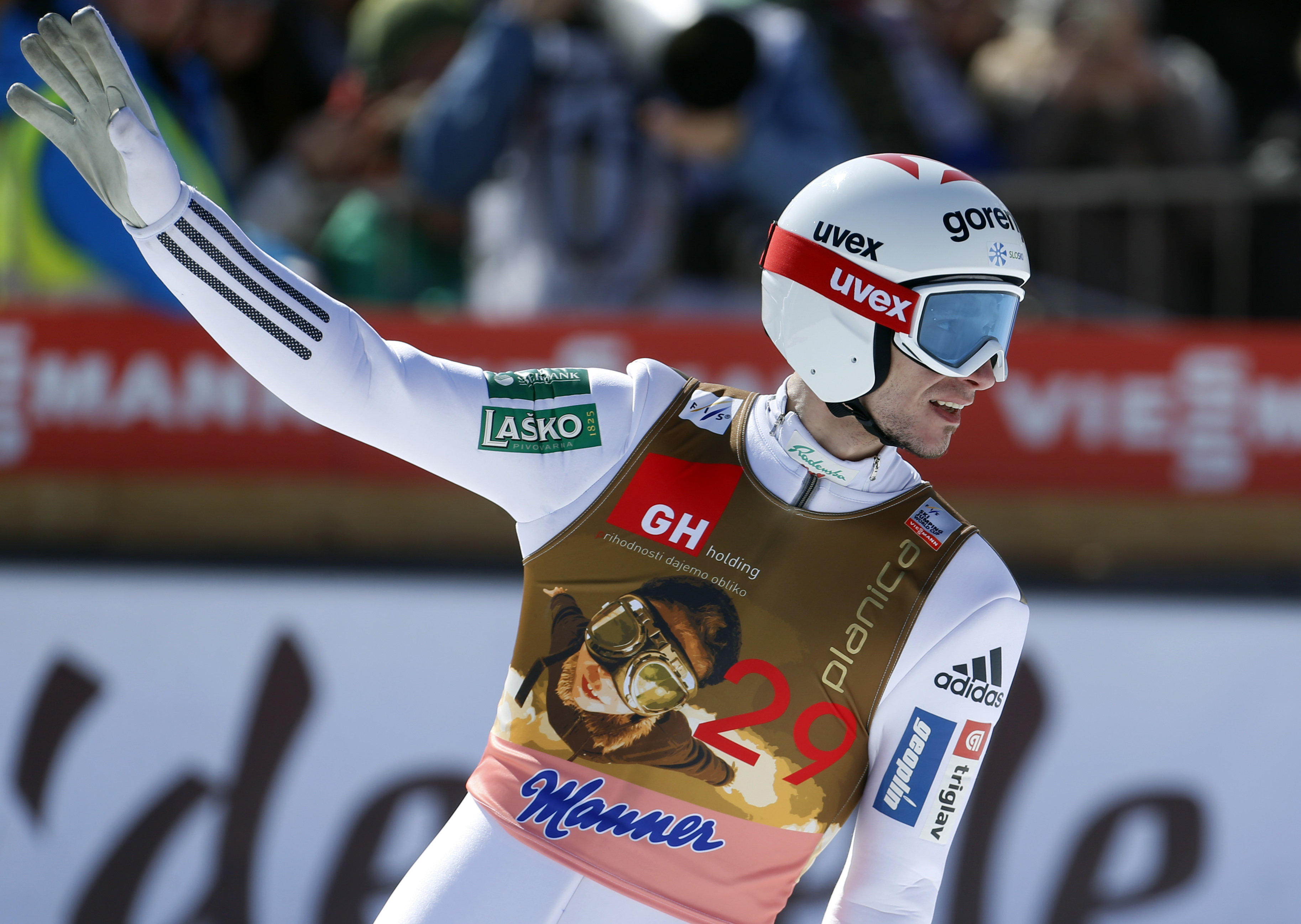 Robert Kranjec of Slovenia celebrates his second place at the Ski Jumping World Cup individual event in Planica, Slovenia, Sunday, March 20, 2016. (AP Photo/Darko Bandic)