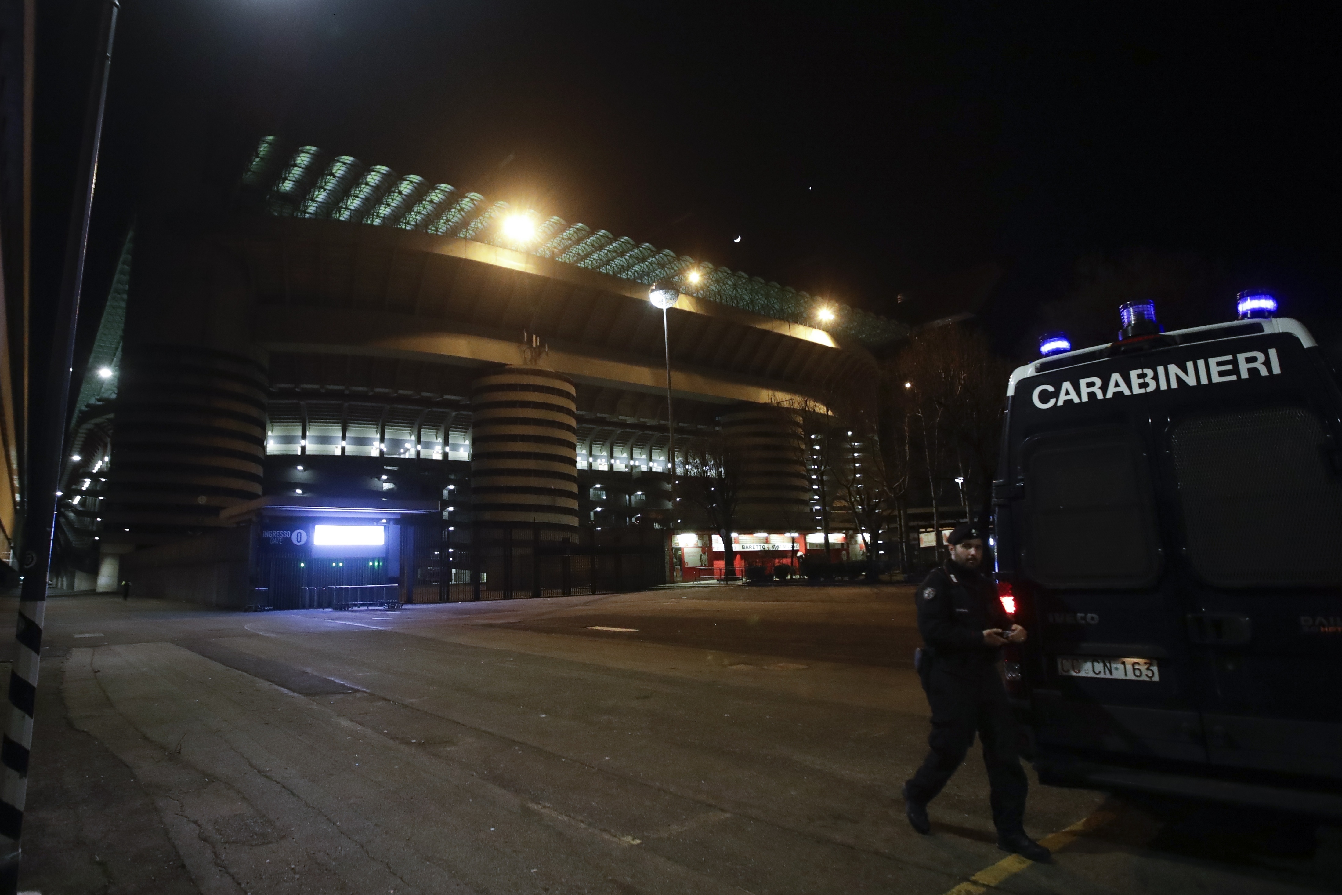 Carabineri (Italian paramilitary police) patrol outside the San Siro Stadium in Milan, Italy, Thursday, Feb. 27, 2020 prior to the Europa League match between Inter Milan and Ludogorets. Ludogorets is playing Italian club Inter Milan in a Europa League so