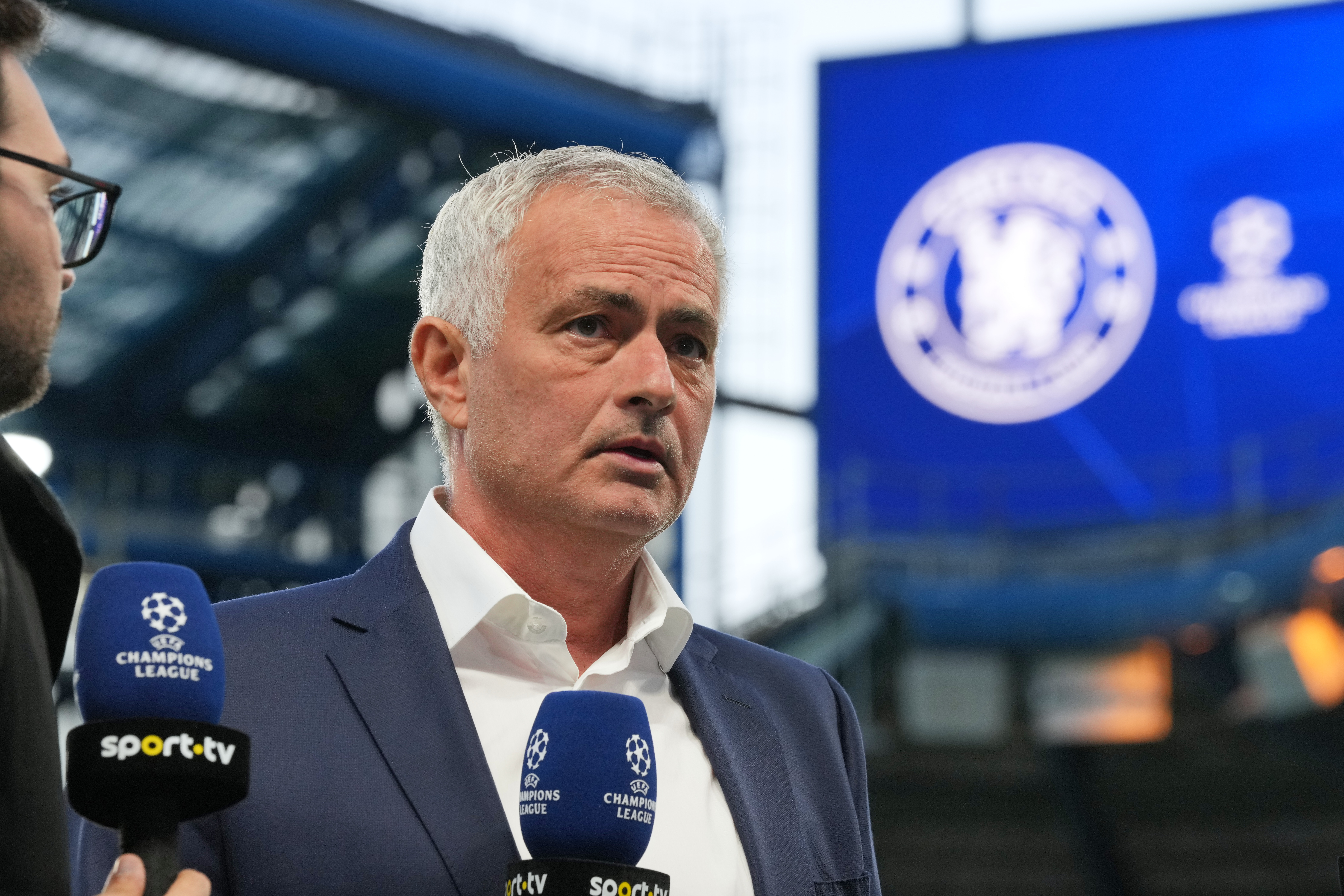 Benfica's head coach Jose Mourinho gives an interview on the pitch ahead of a Champions League opening phase soccer match between Chelsea and SL Benfica at Stamford Bridge stadium in London, Tuesday, Sept. 30, 2025. (AP Photo/Kin Cheung)