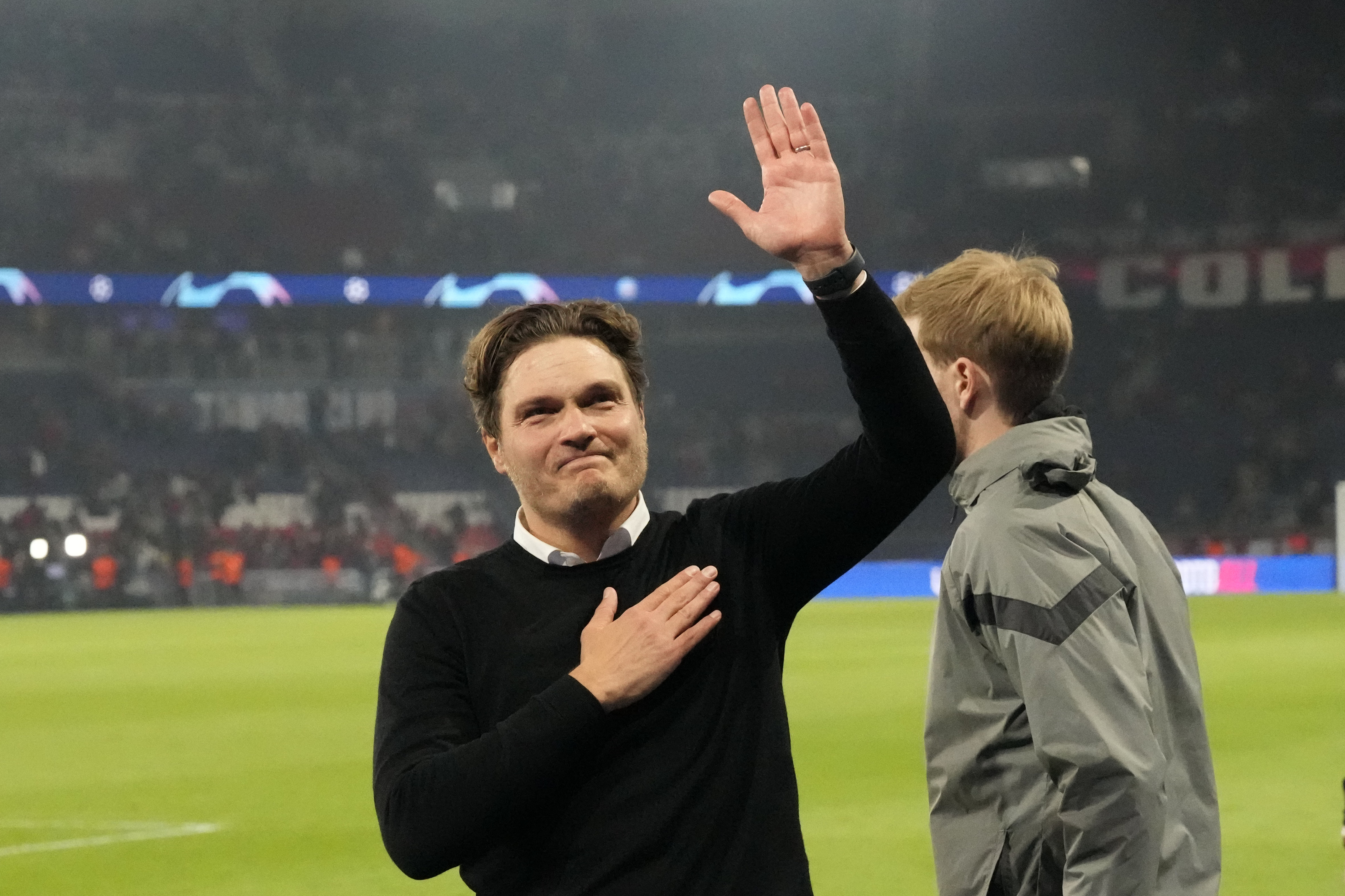 Dortmund's head coach Edin Terzic applauds fans at the end of the Champions League semifinal second leg soccer match between Paris Saint-Germain and Borussia Dortmund at the Parc des Princes stadium in Paris, France, Tuesday, May 7, 2024. (AP Photo/Frank