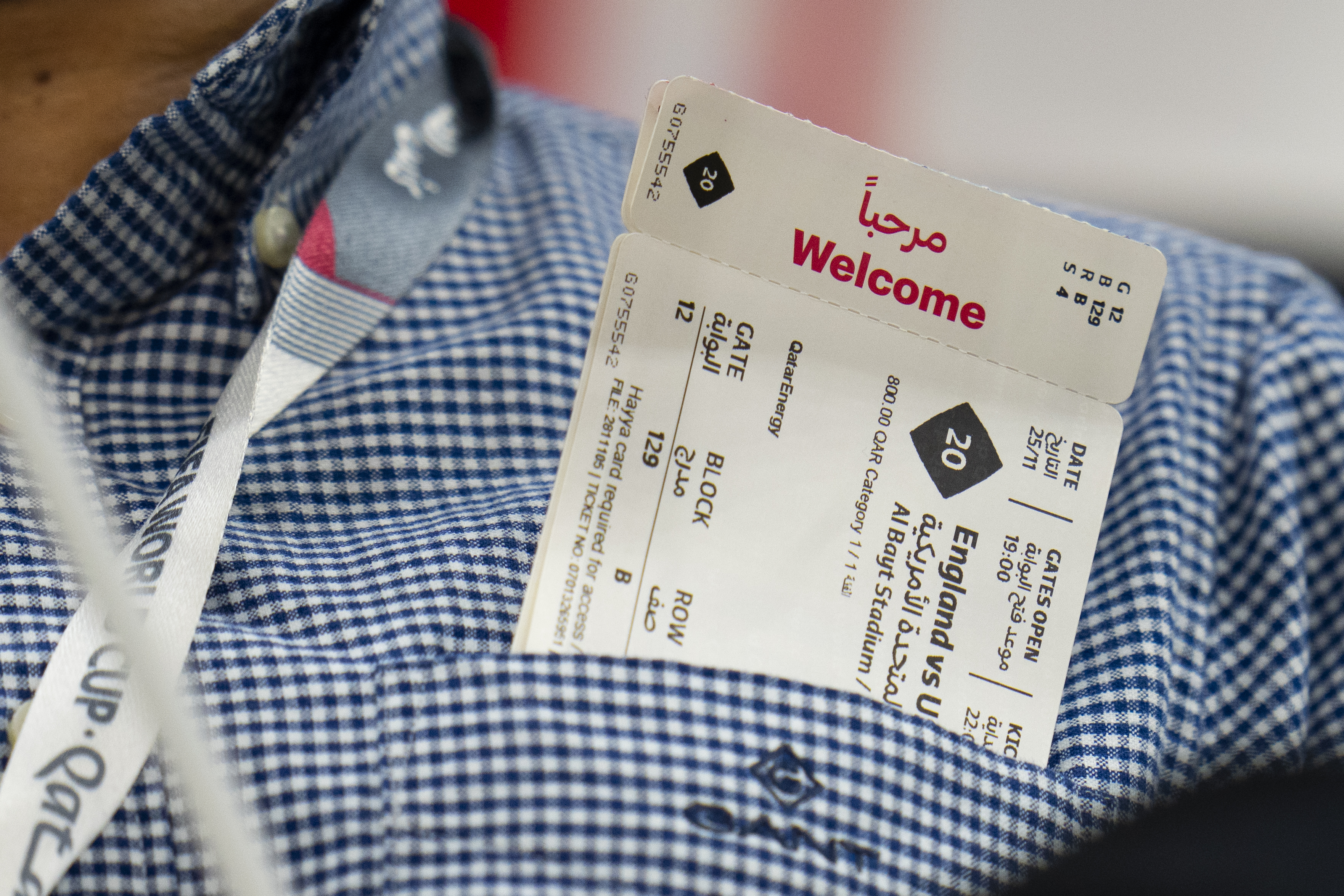A game ticket is seen on the shirt pocket of a spectator during the World Cup group B soccer match between England and The United States, at the Al Bayt Stadium in Al Khor , Qatar, Friday, Nov. 25, 2022. (AP Photo/Julio Cortez)