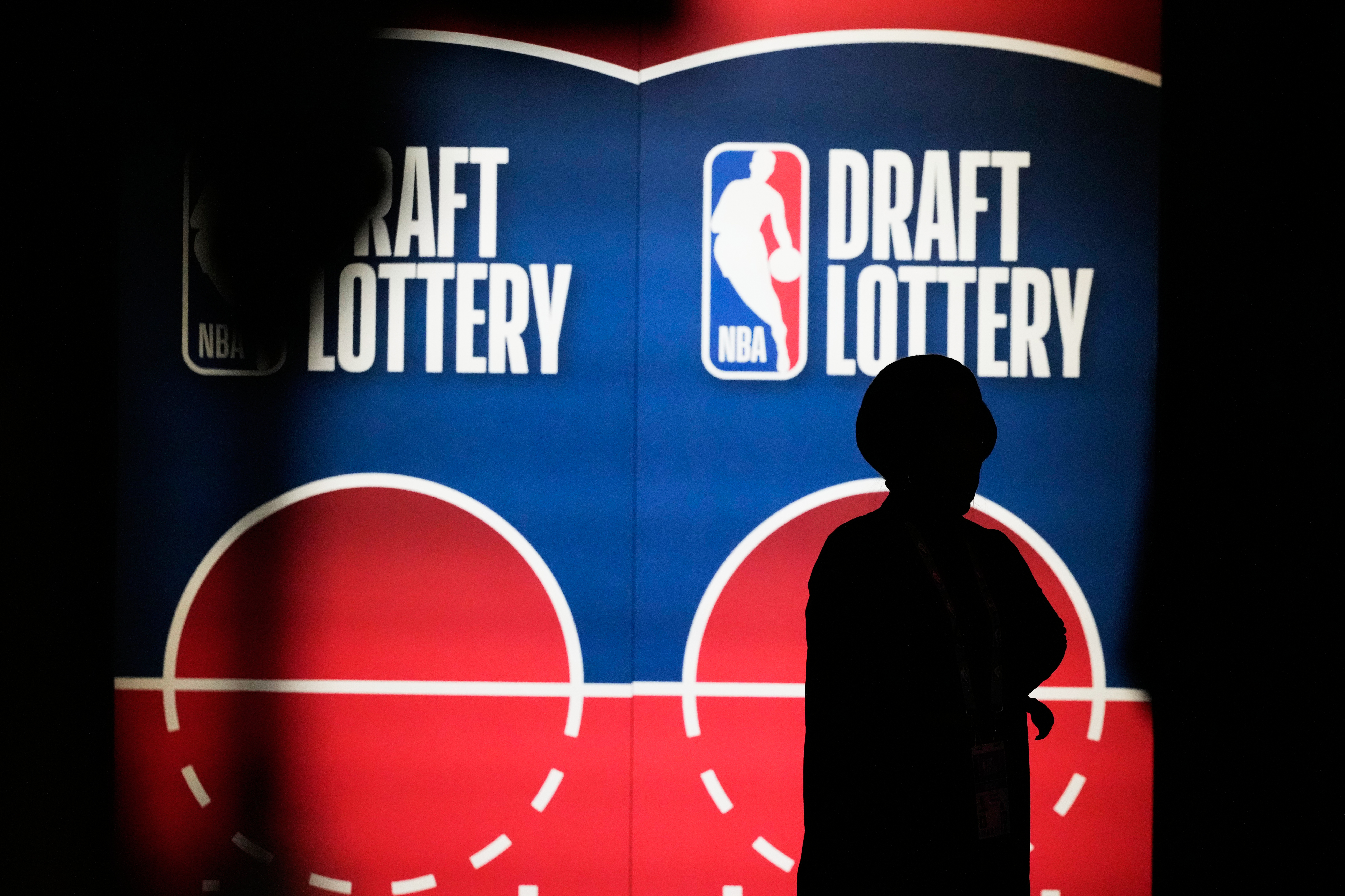 A person attends the NBA basketball draft lottery in Chicago, Sunday, May 10, 2026. (AP Photo/Nam Y. Huh)