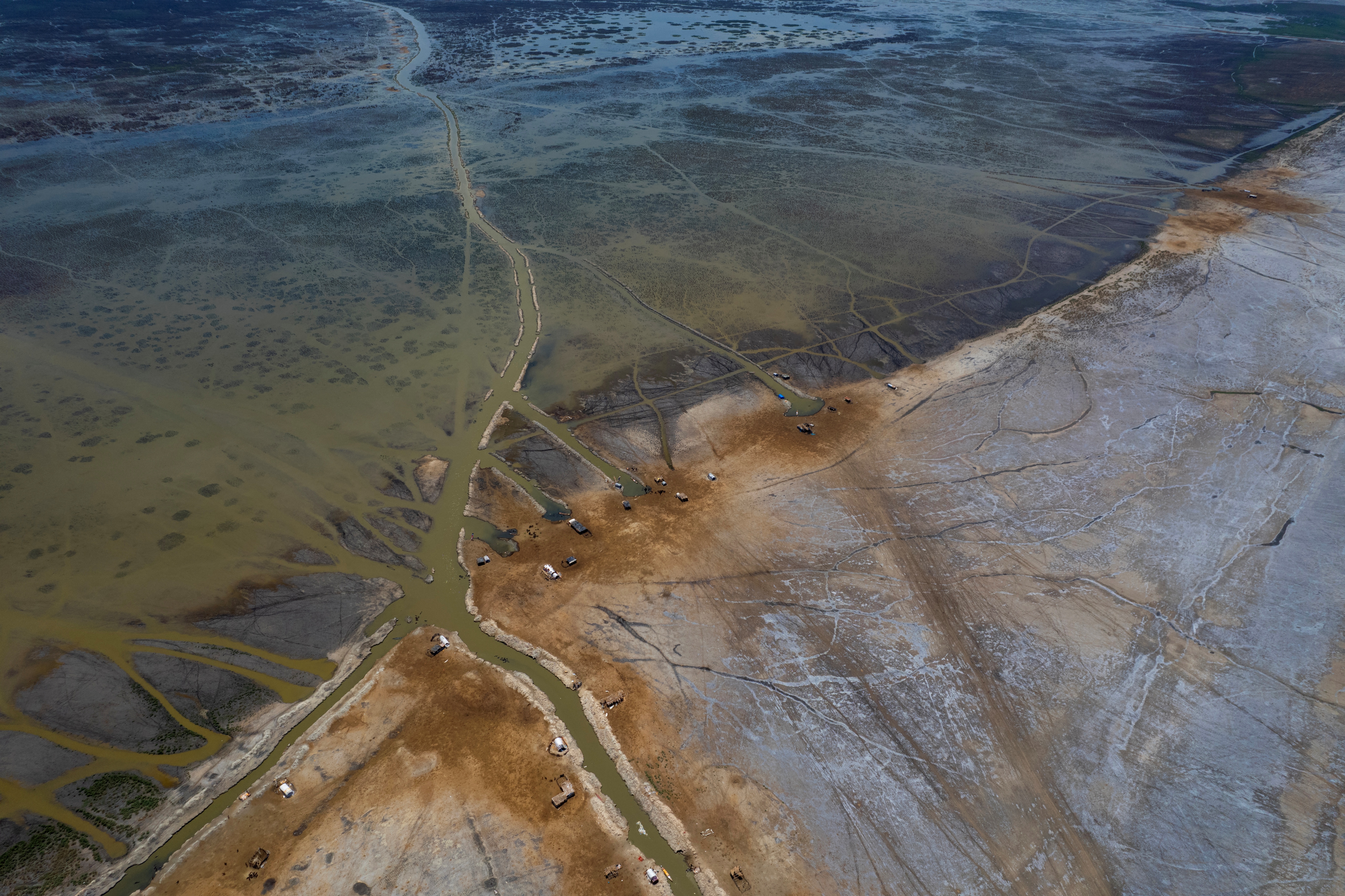 An aerial photograph shows the al-Chibayish Marches