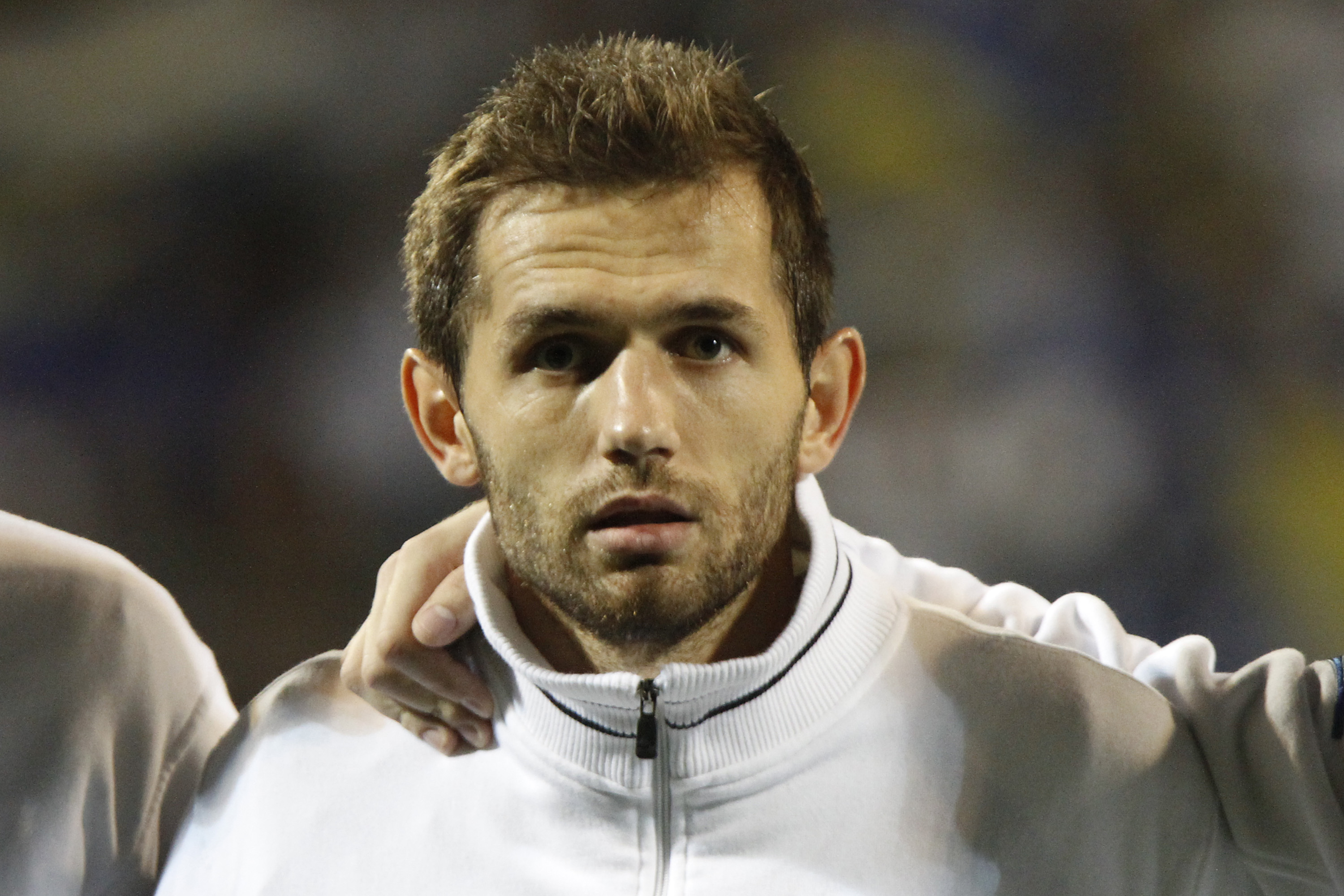 Bosnia's player Senad Lulic pose for photo before  World Cup 2014 Group G qualifying soccer match at Stadium Bilino Polje  in Zenica, Bosnia, on  Friday, Oct. 11, 2013. (AP Photo/Amel Emric)