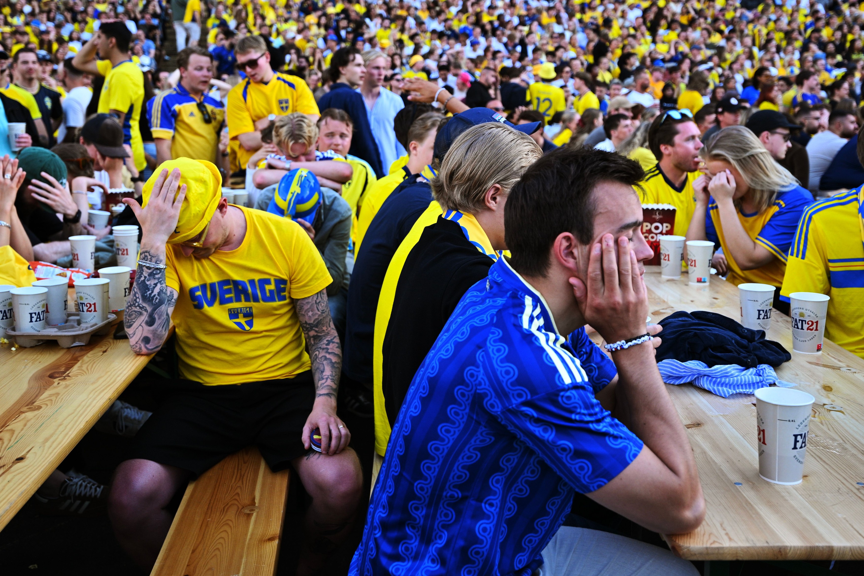 Football fans are sad after a 4-0 defeat as Sweden