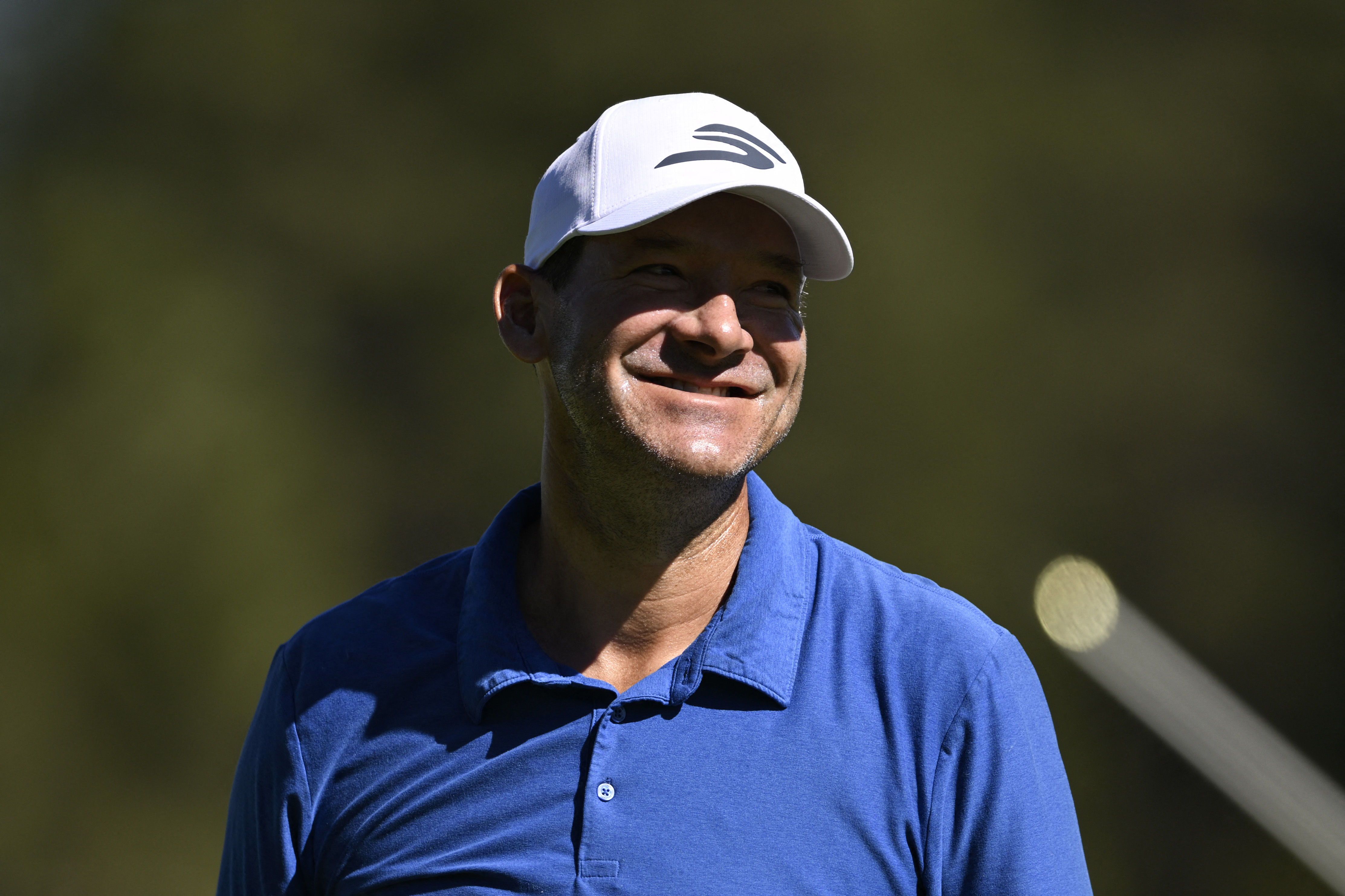 STATELINE, NEVADA - JULY 11: Tony Romo reacts after his putt on the first green during