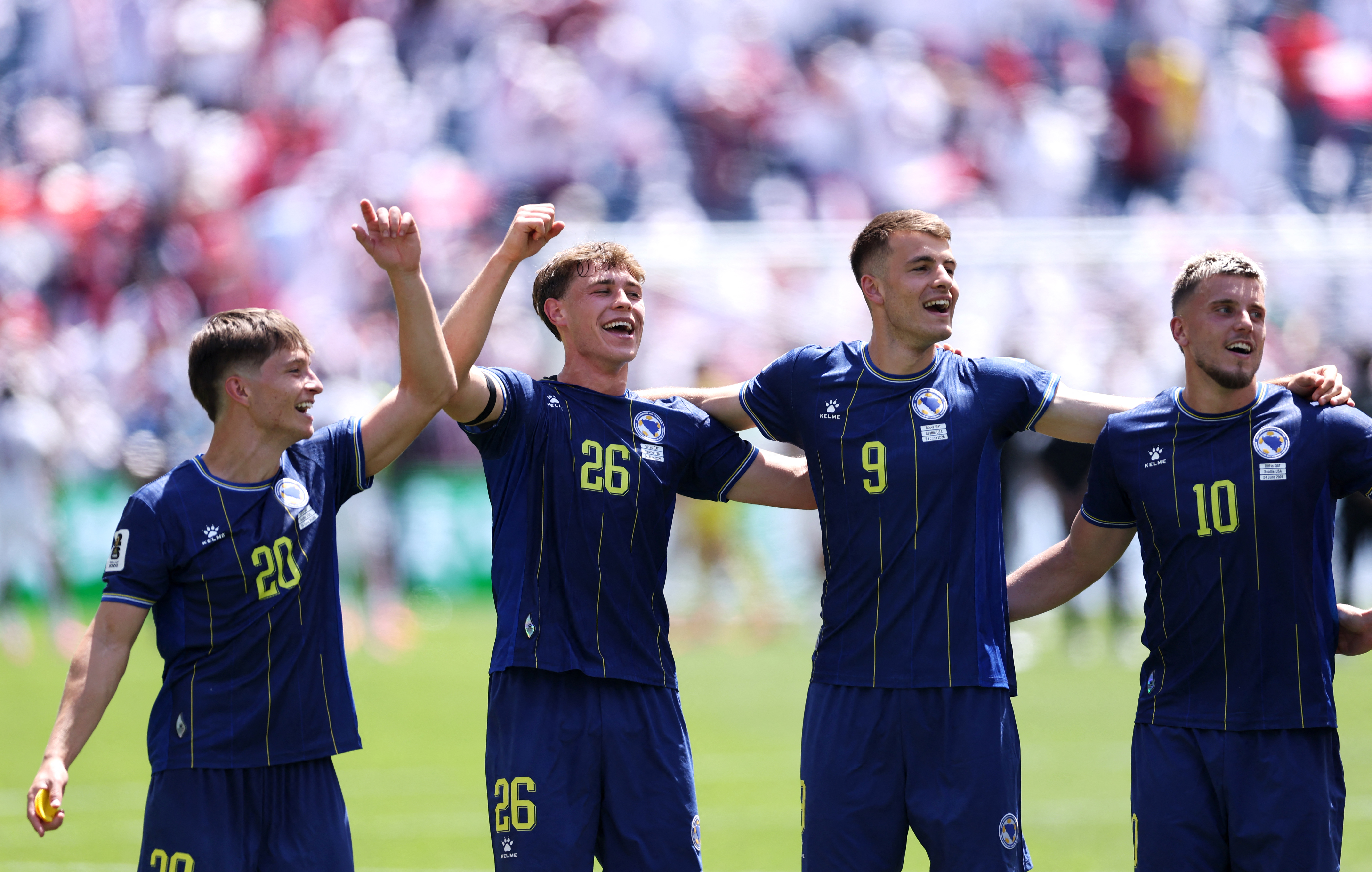 063_2283171423SEATTLE, WASHINGTON - JUNE 24: Esmir Bajraktarevic #20, Ermin Mahmic #26, Samed Bazdar #9 and Ermedin Demirovic #10 of Bosnia and Herzegovina celebrate after the 3-1 win during the FIFA World Cup 2026 Group B match between Bosnia and Herzego