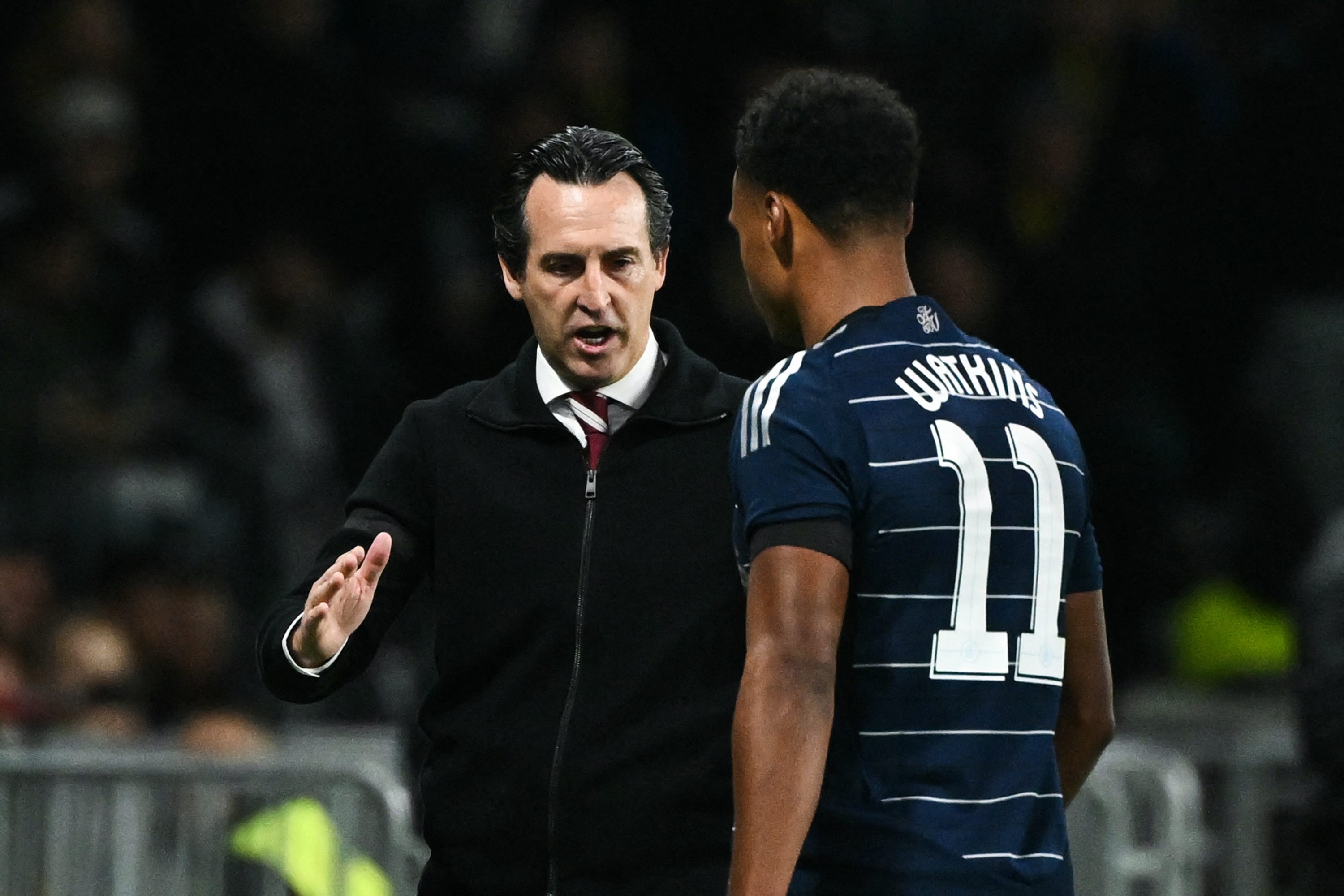 Aston Villa's Spanish coach Unai Emery congratulates Aston Villa's English forward #11 Ollie Watkins as he leaves the pitch during the UEFA Champions League 1st round day 1 football match between Young Boys and Aston Villa, at the Wankdorf Stadium in Bern
