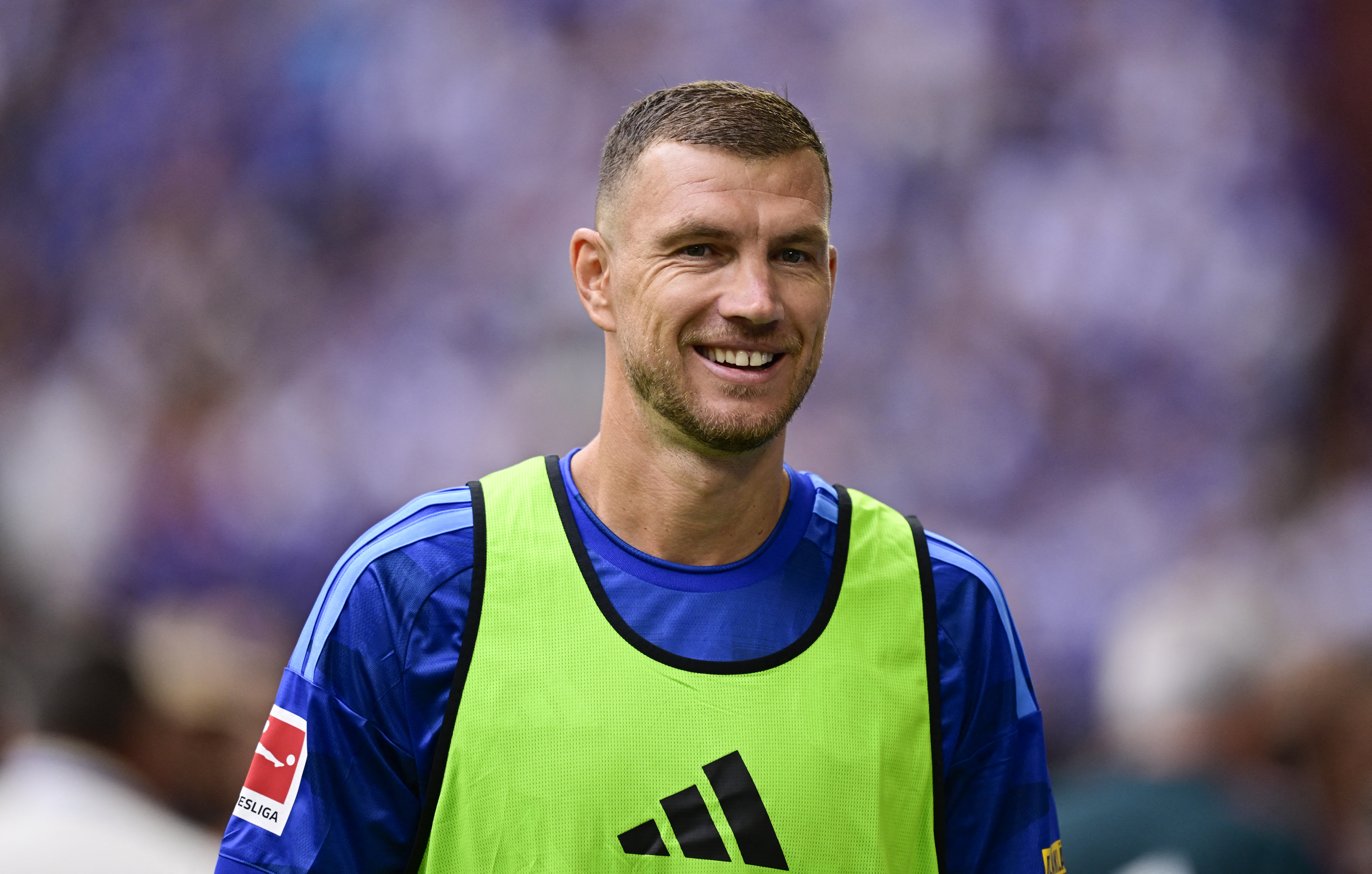 Schalke's Bosnian forward #10 Edin Dzeko looks on ahead the pre-season friendly football match between FC Schalke 04 and Real Madrid in Gelsenkirchen, western Germany, on August 16, 2026. (Photo by INA FASSBENDER / AFP)
