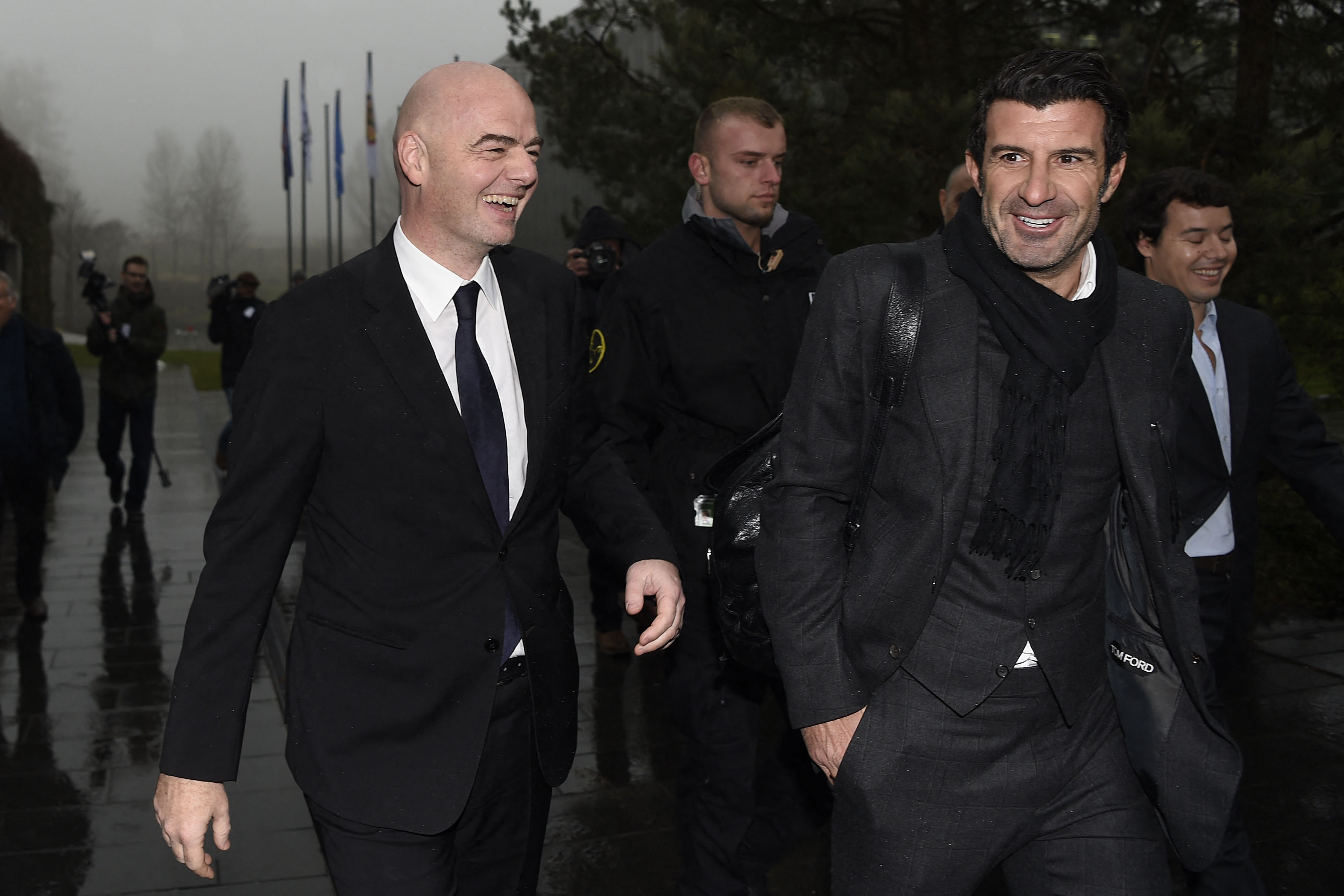 Newly-elected FIFA president Gianni Infantino (L) and former Portuguese international