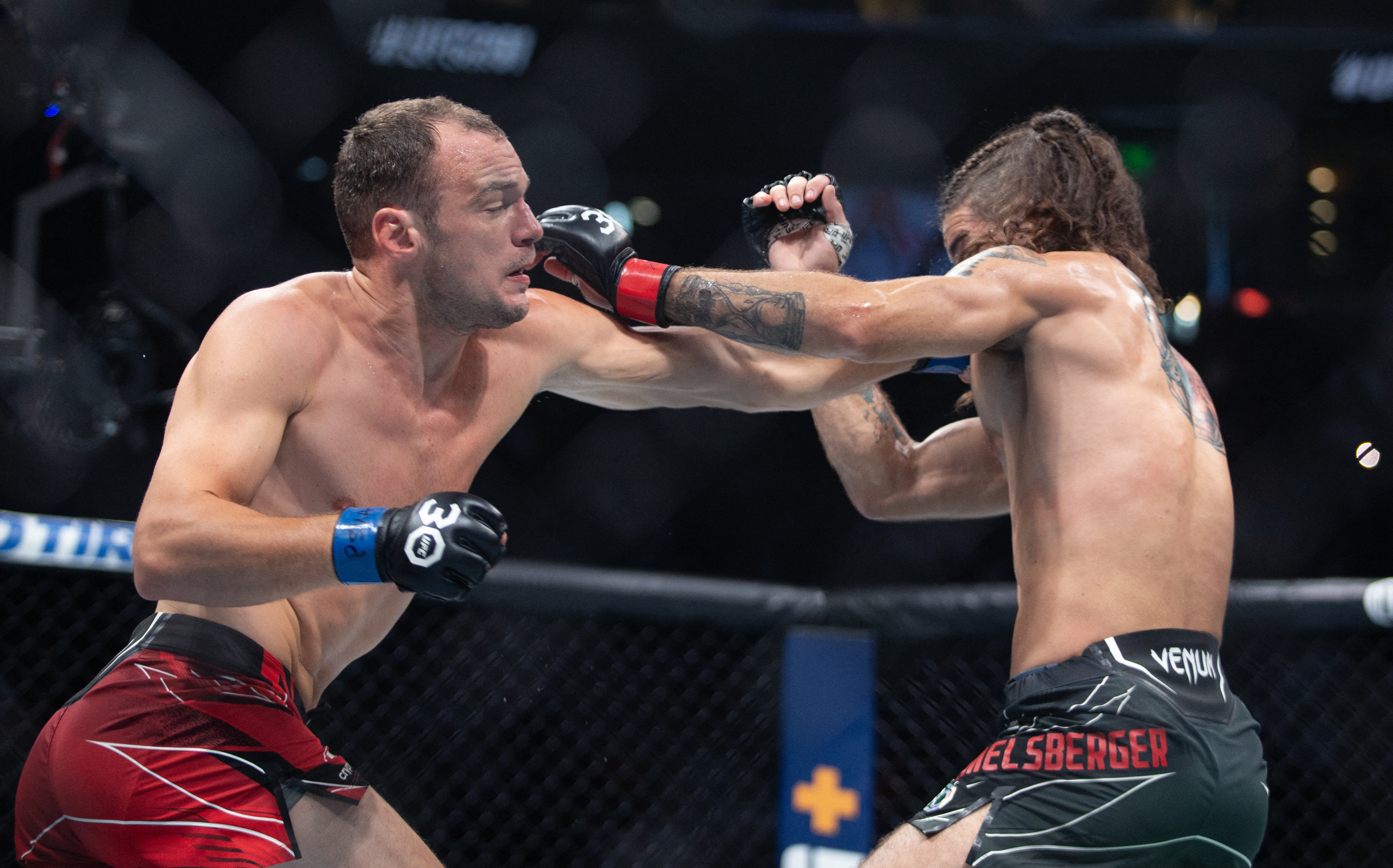 SALT LAKE CITY, UT - JULY 29: Uros Medic throws a punch at Matthew Semelsberger
