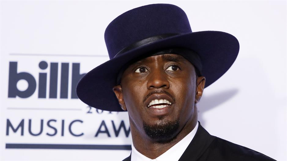 pi didi paf dedi šon kombs Reuters