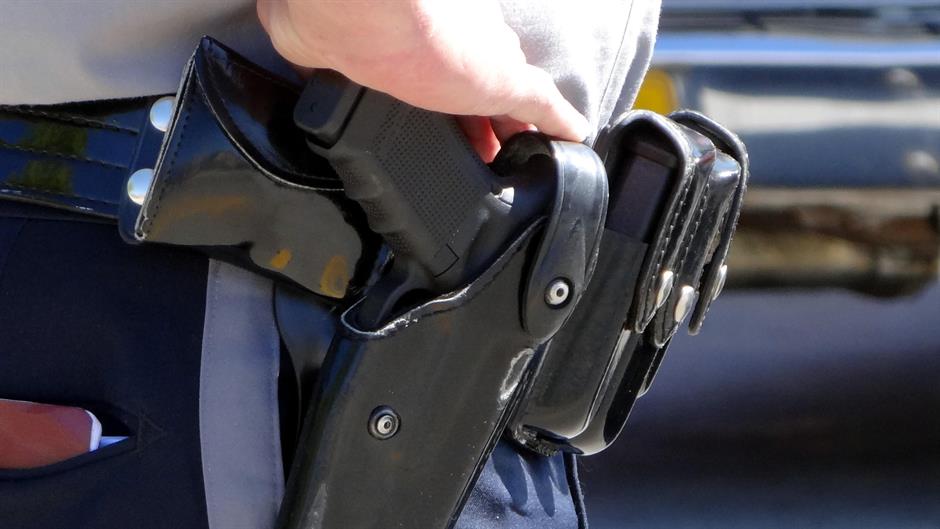 POLICE OFFICER-SIDEARM